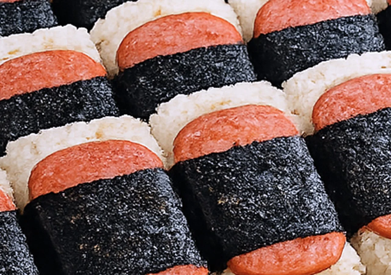 Image of spam musubi in full tray for catering menu.