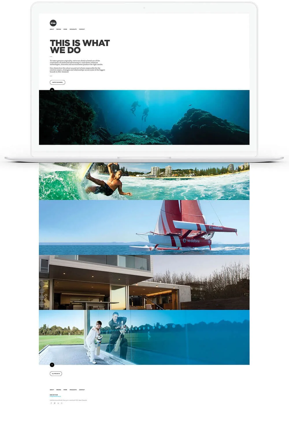 A website layout with images of water and outdoor activities, including scuba diving, surfing, sailing, and playing on the lawn, displayed on a laptop screen.