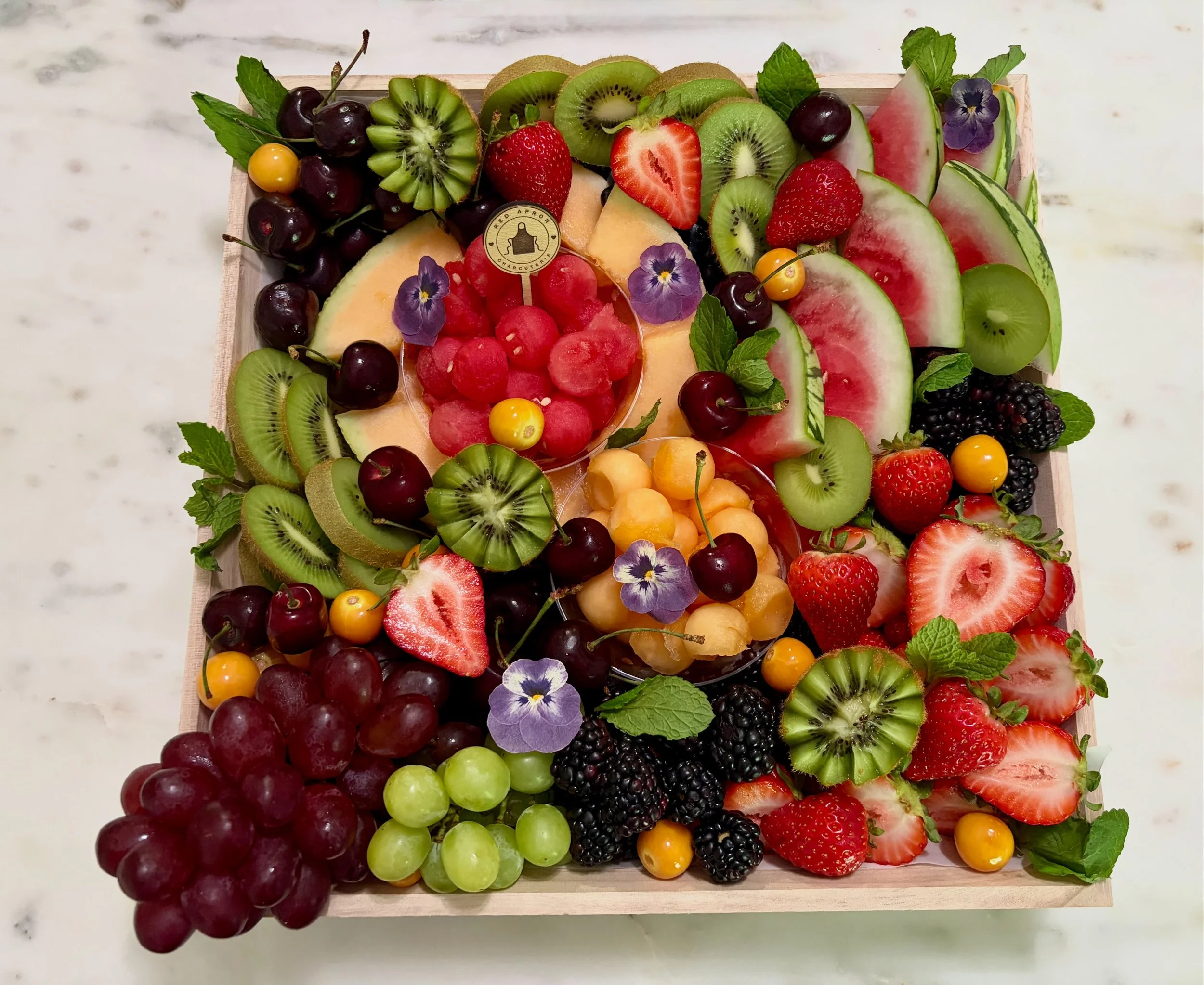 Summer calls for a grazing table. ☀️🍉🥕 What&rsquo;s your first grab&mdash;🥒 Crudit&eacute;s, 🍓 Fruit, or 🧀 Charcuterie? Tell me in the comments! 💛

#SummerEntertaining #CharcuterieBoard #Crudit&eacute;s #FruitBoard #grazingtable