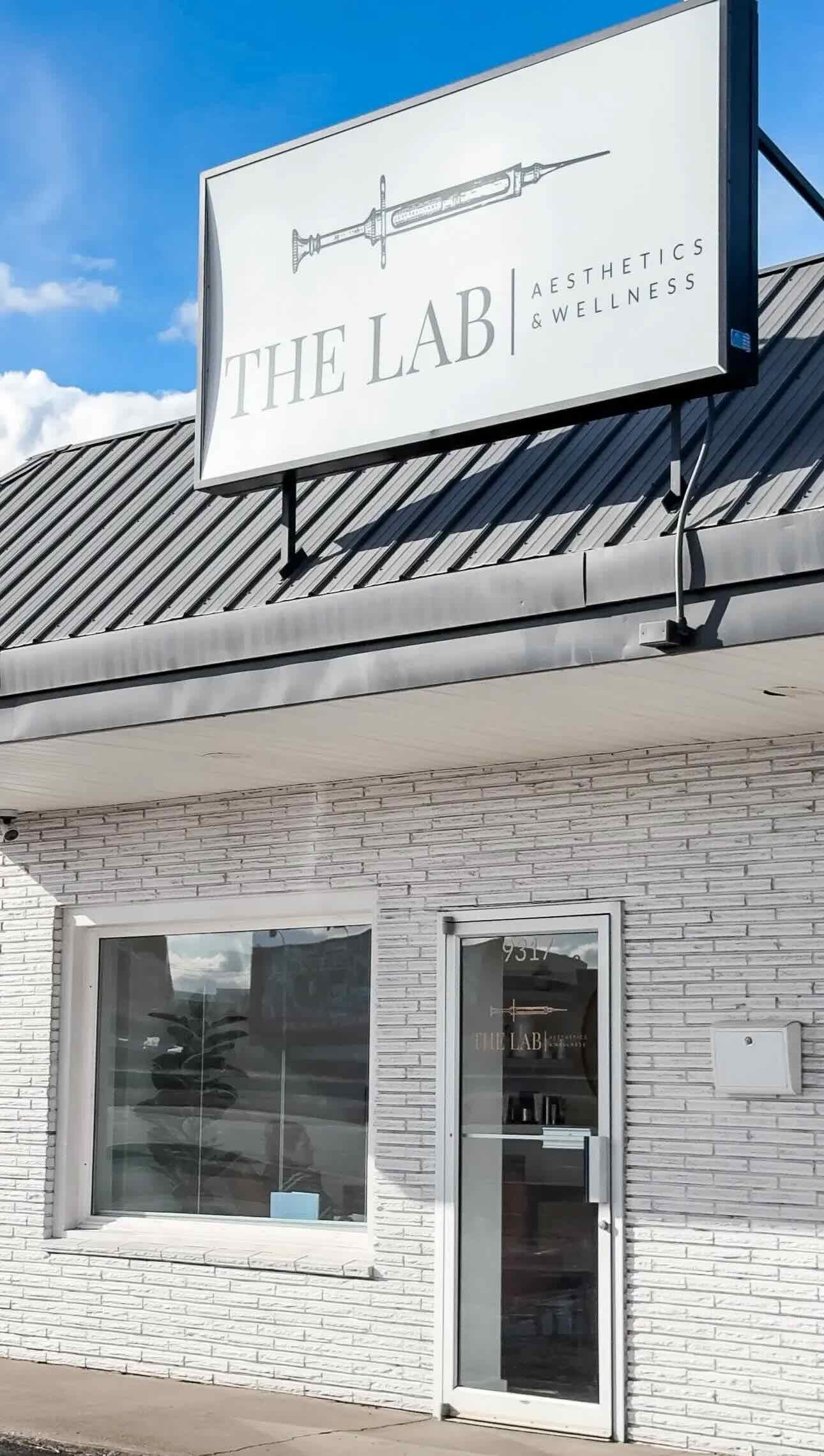 An outdoor sign of The LAB Aesthetics and Wellness