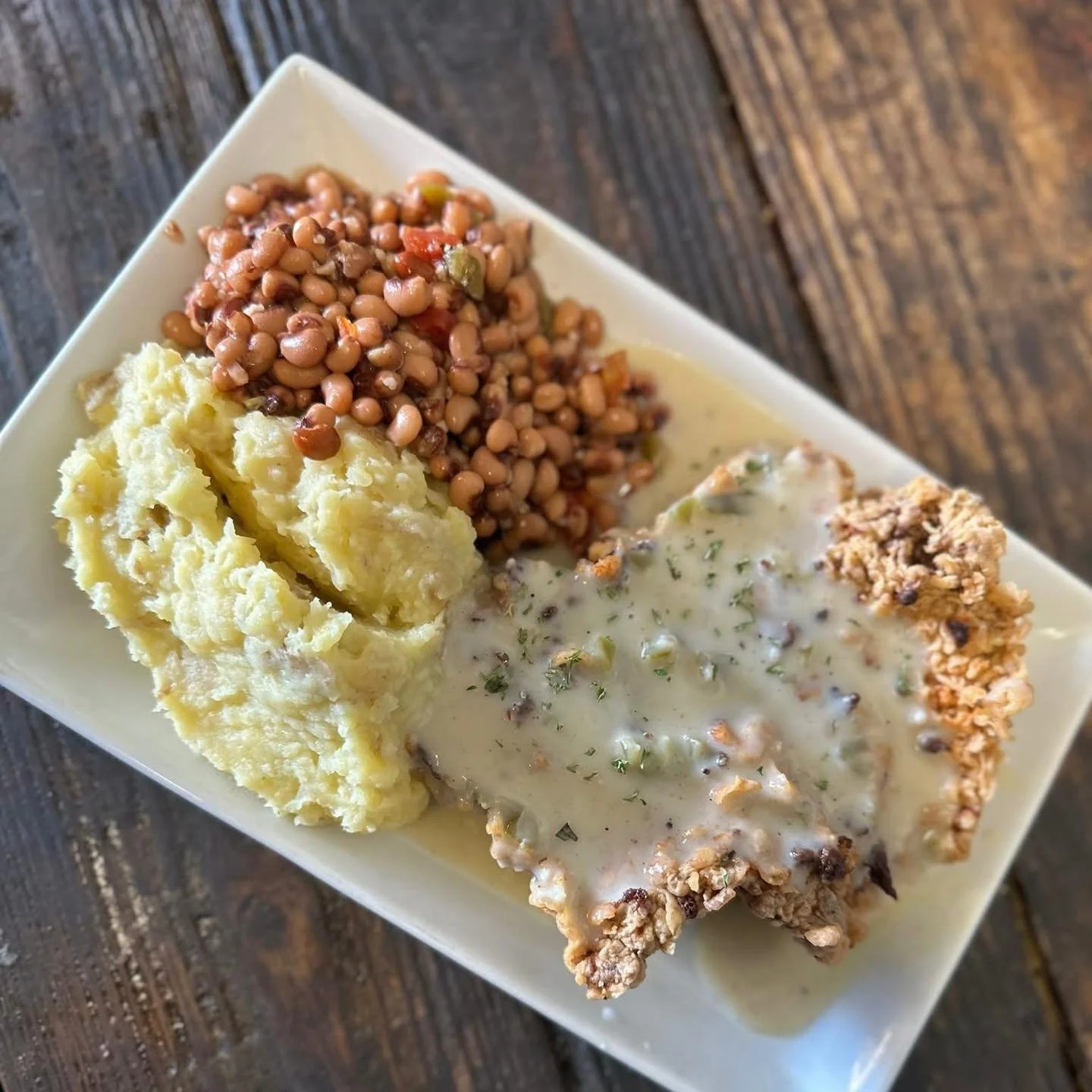 Chicken Fried Steak kind of day 🤠🍽️

Served from 11am&ndash;8pm, topped with jalape&ntilde;o cream gravy and paired with two sides.

Come hungry&mdash;we&rsquo;ve got you covered.
.
.
.
#bigtastetinytown #royersroundtopcafe #roundtoptx
