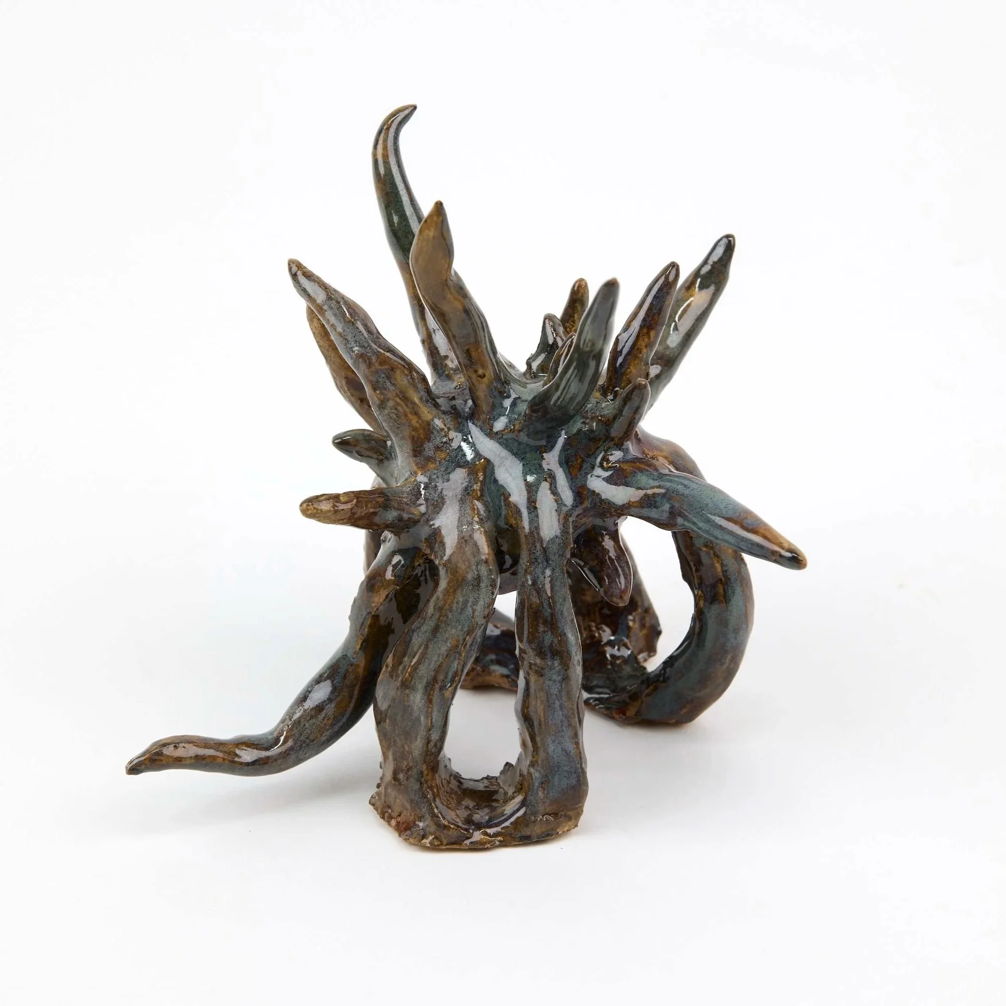 Tusk, 2025. Glazed earthenware — 10 x 10.5 x 10 cm