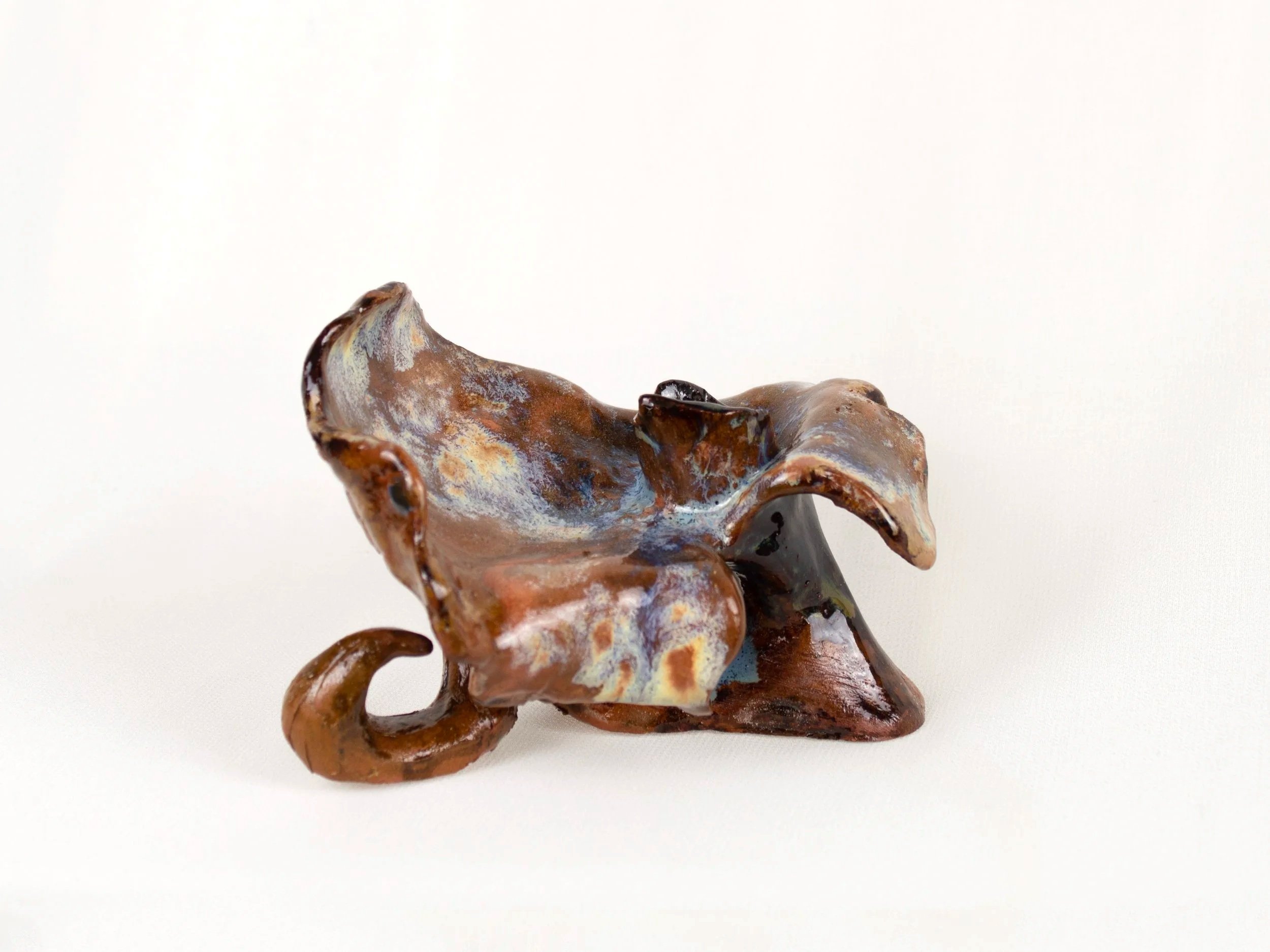 Ripples, 2025. Glazed earthenware — 11 x 6.5 x 8 cm