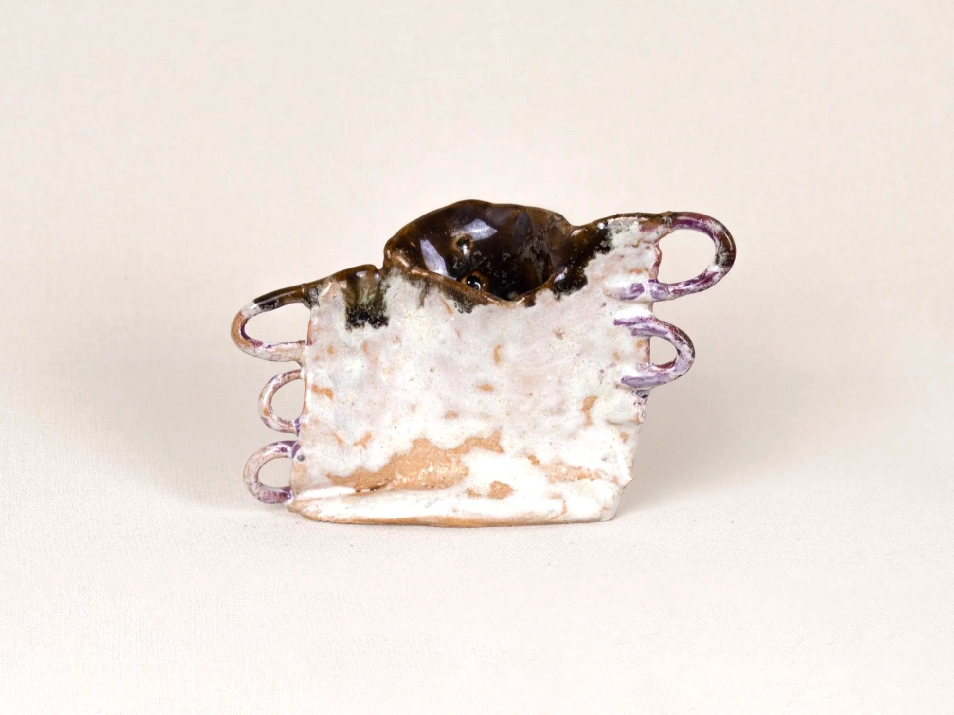 Envelop Single Flower Vas, 2024. Glazed earthenware — 10 x 6 x 2.5 cm