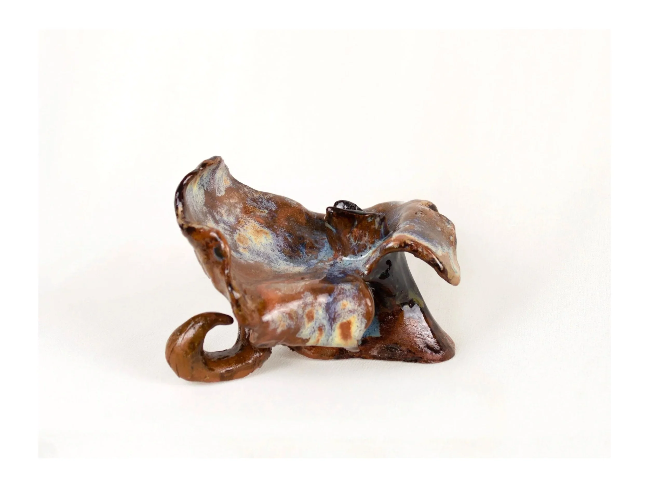 Ripples, 2025. Glazed earthenware — 11 x 6.5 x 8 cm