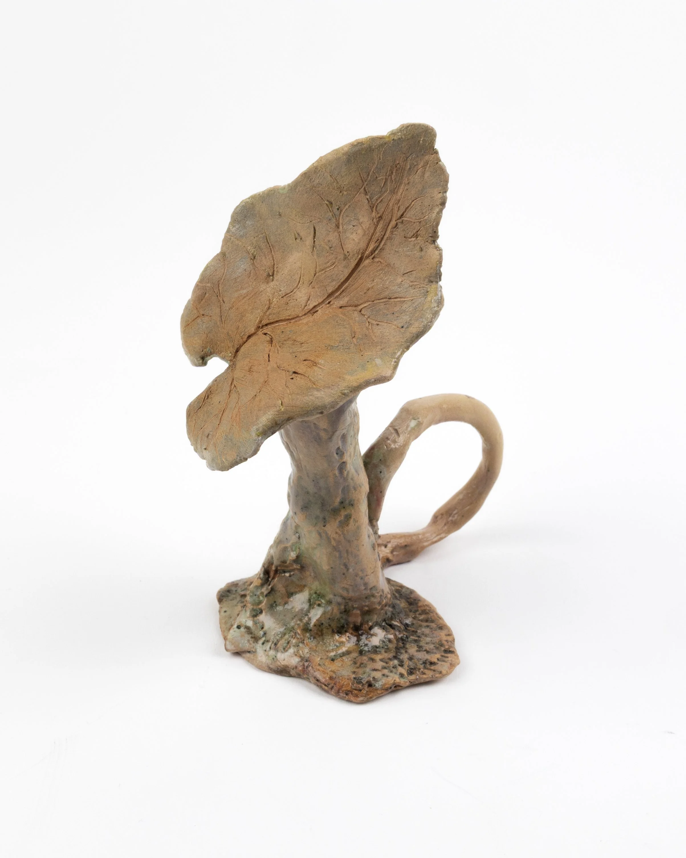 Adrift, 2025. Glazed earthenware — 5 x 8.5 x 13 cm