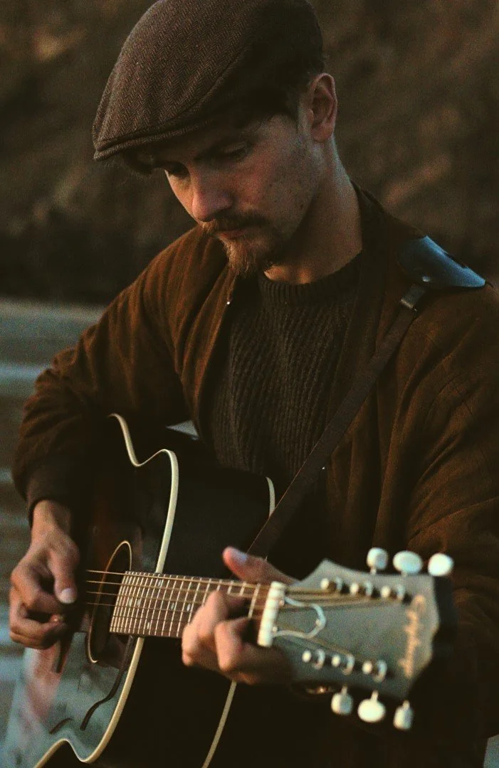 Live music performed by Ben Banford in our Secret Garden.