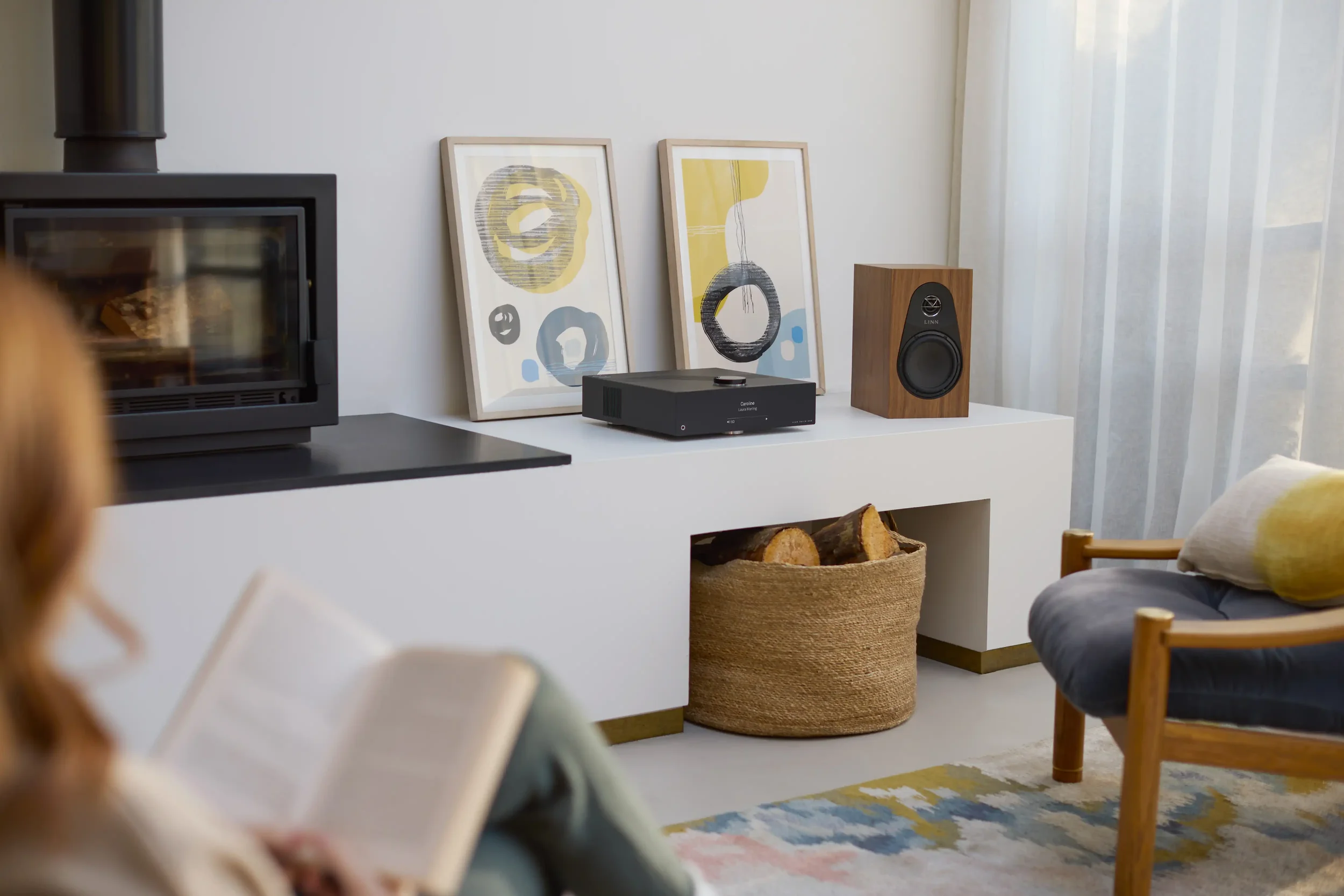 Living room with artwork and a Linn Majik Music System.