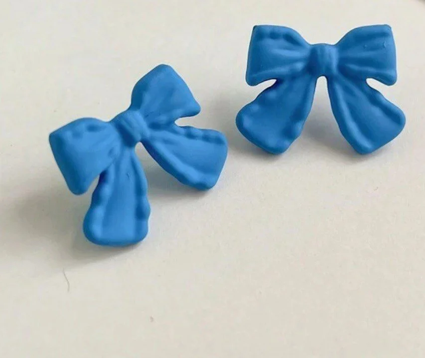 light blue bow earrigs.jpg