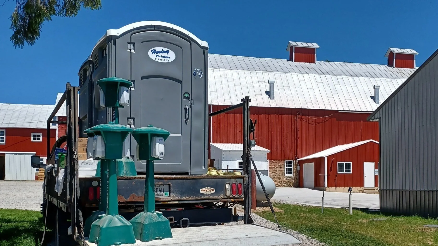Oranssi technician working on a roof project
