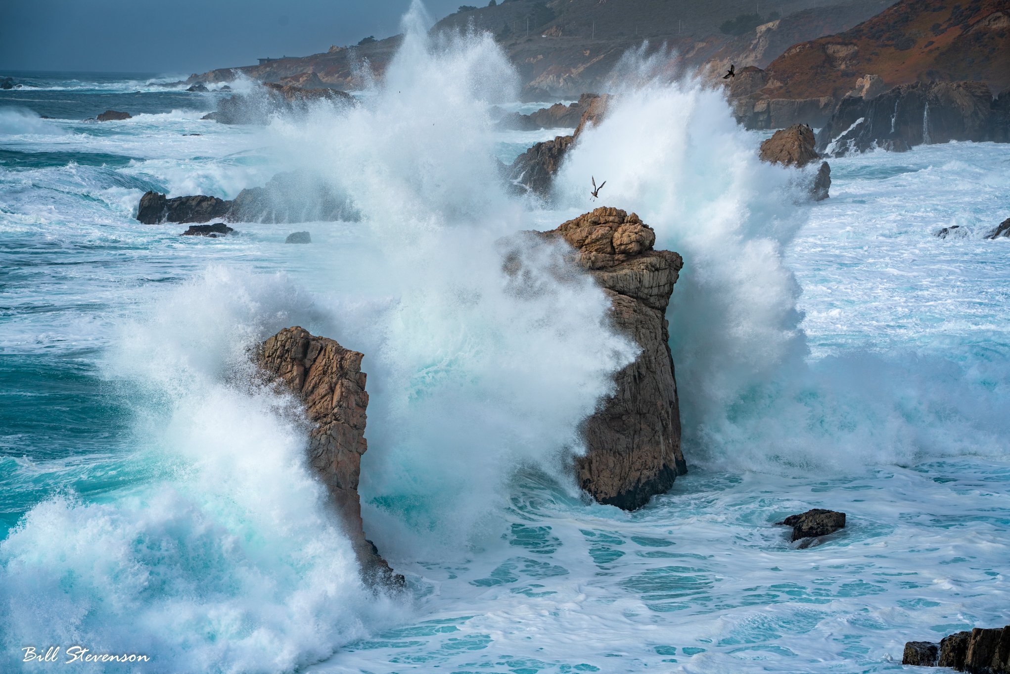Fine art landscape photography of waves crashing into seastacks at Garrapota Beach, CA