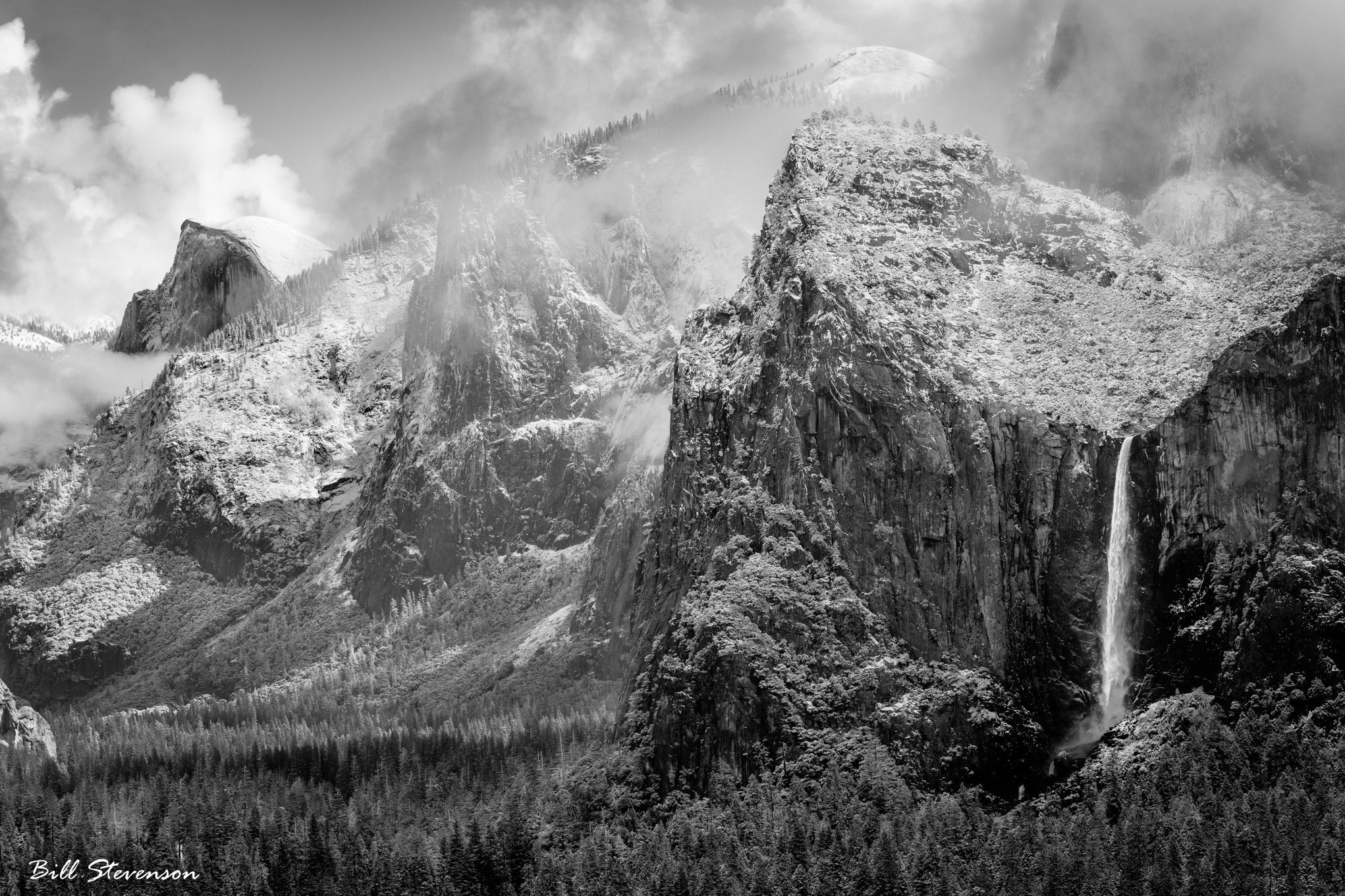A black and white photo of Bridalveil Falls and Yosemite Valley in winter (Copy)