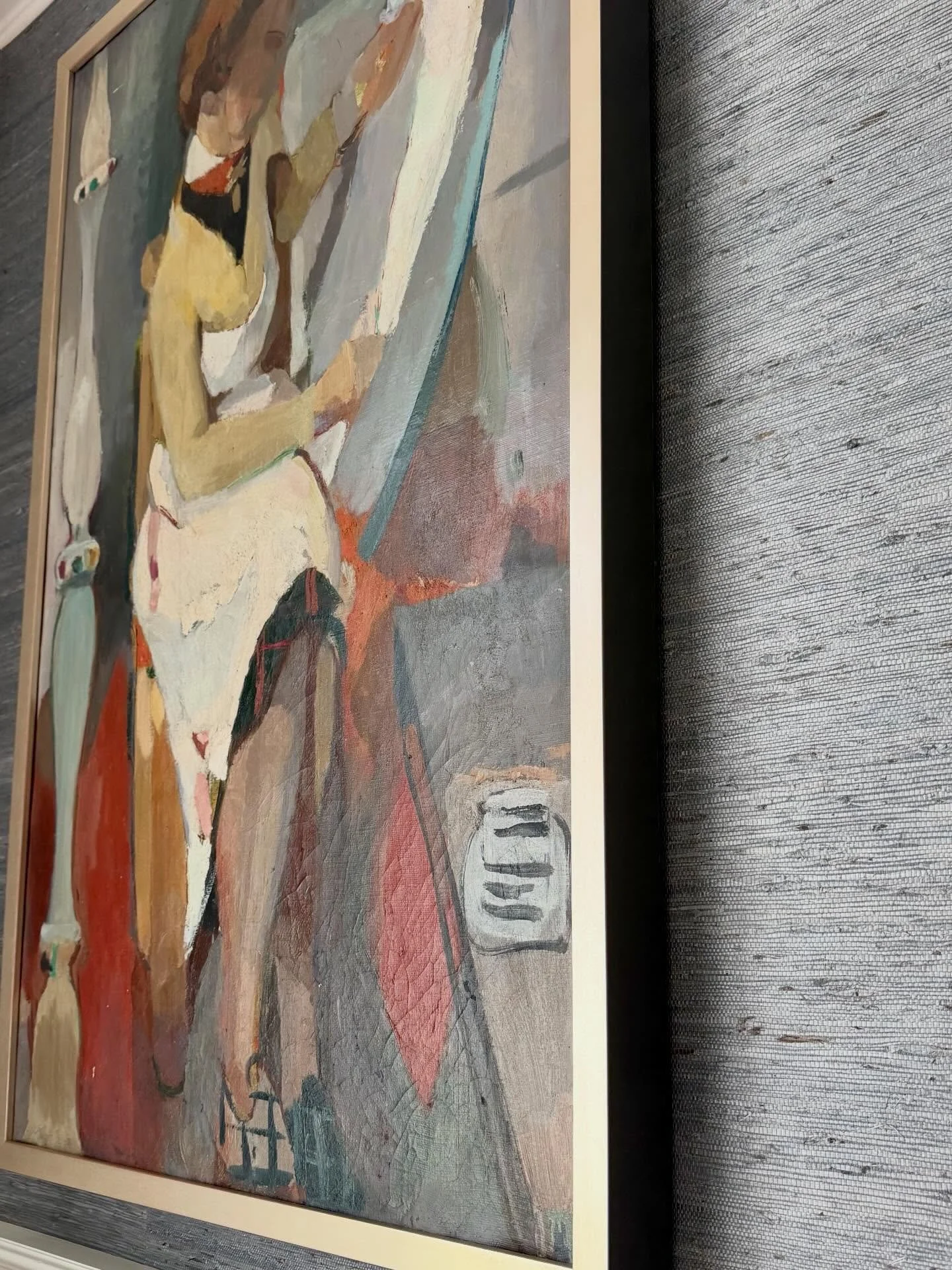 Sometimes the layers come later.  We loved the navy painted wall in the client&rsquo;s dining room but it just wasn&rsquo;t keeping up with the original artwork.  So, a beautiful grass cloth wallpaper that has rich blue/gray tones was the perfect des