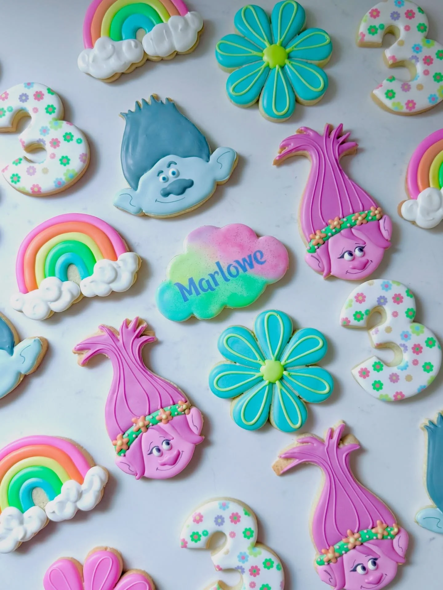 We do not approve this gloomy weather&hellip;

so we&rsquo;re bringing the sunshine and rainbows to you 🌈🤗

#trollscookies
#trollsbirthday
#customcookies
#sugarcookies
#cookiedecorating