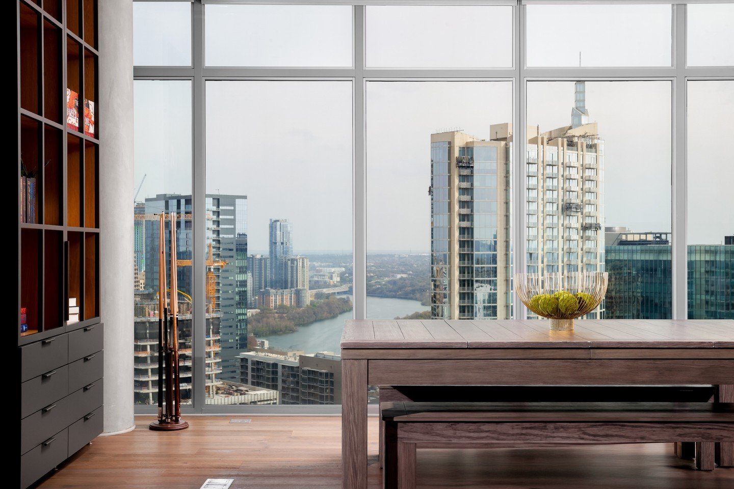 Discover the Junior Penthouse at Fifth &amp; West, an urban sanctuary offering protected views of downtown Austin and Lady Bird Lake. Situated in the bustling Market District, this prestigious high-rise, crafted by acclaimed architect Michael Hsu, pu
