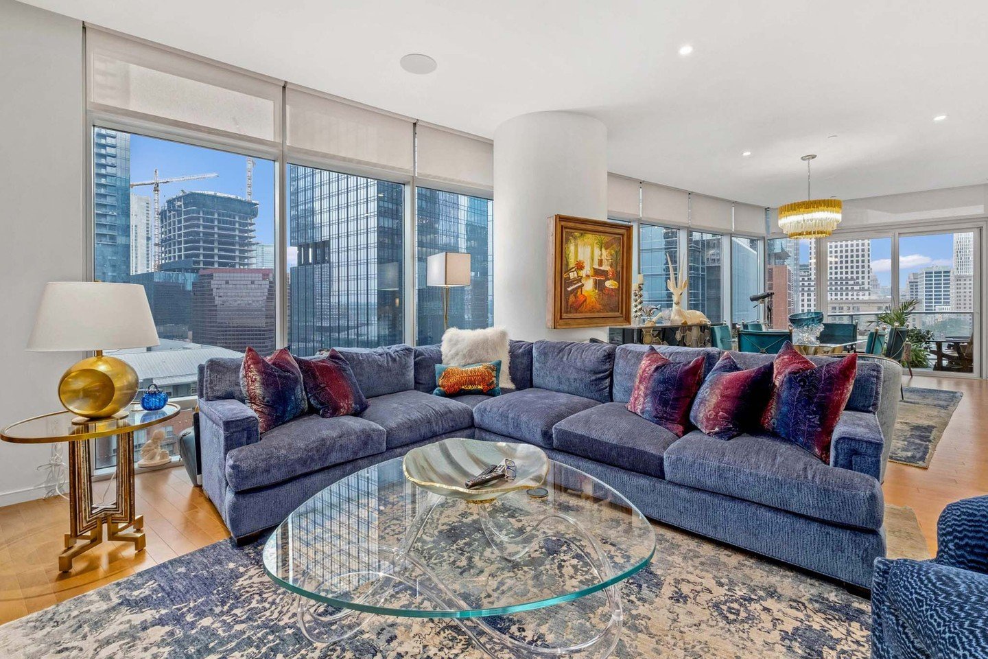 Welcome to luxury living at its finest in Unit 12E at The Austonian. Nestled in the northwest corner with Texas Capitol views, this residence boasts an inviting open floor plan flooded with natural light. Step onto your private terrace and savor brea