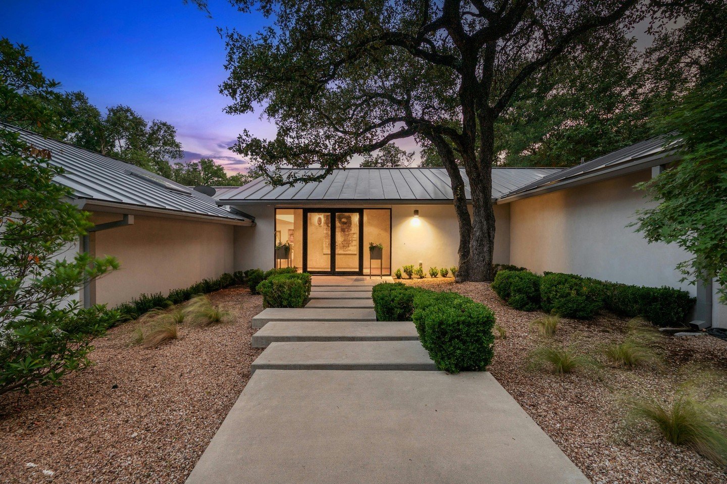 A modern designer classic, this fully remodeled timeless home is nestled in the heart of Rollingwood. The renovation was brought to life by acclaimed builder Erik Gonzales and nationally recognized interior designer Joel Mozersky. Once inside, you&rs