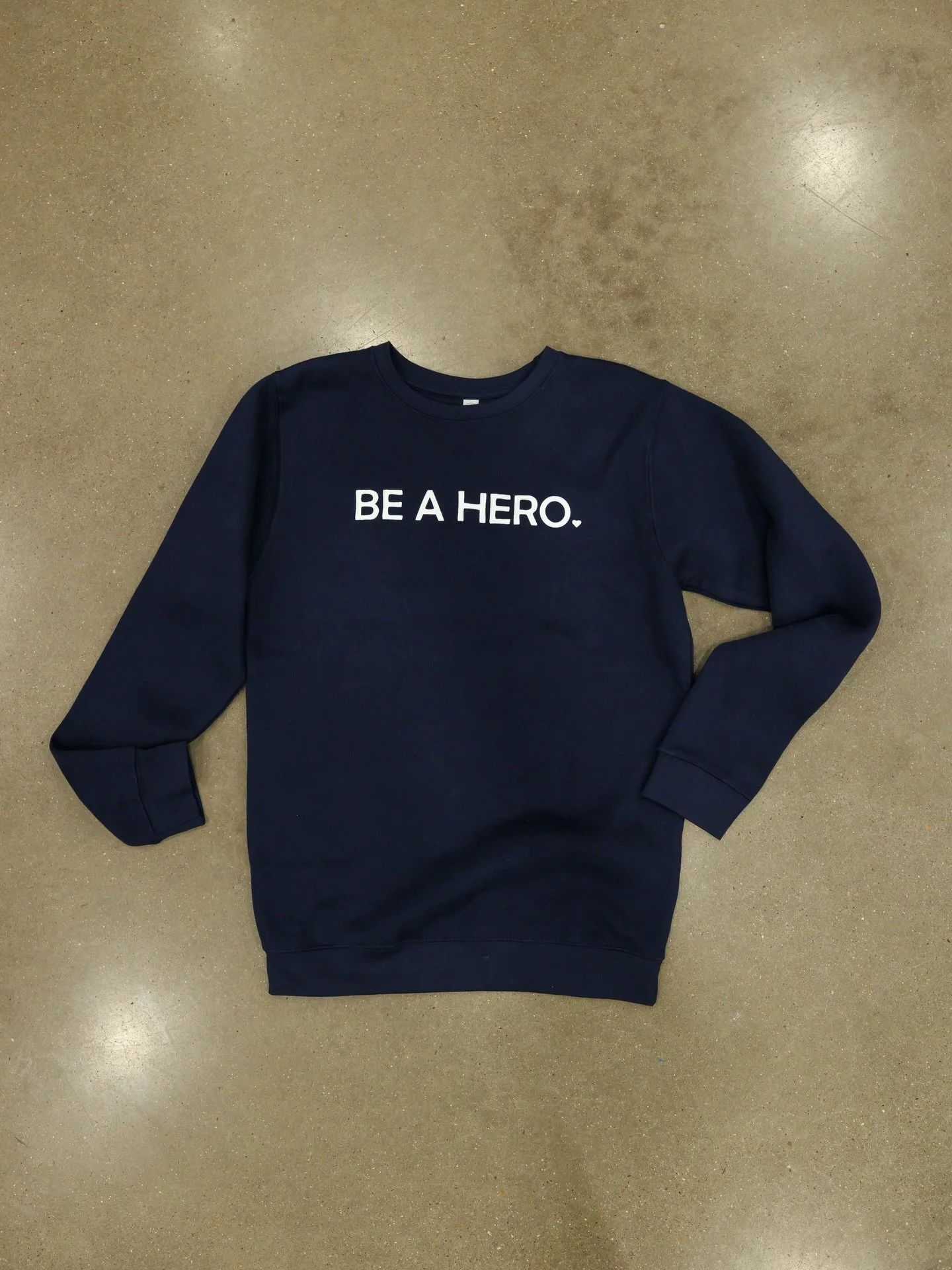 &lsquo;Tis the season of needing a sweatshirt in the morning, then it&rsquo;s 80&deg; by lunch. Why not make it a sweatshirt that supports a good cause!

Our newest &lsquo;Be A Hero&rsquo; crewneck is available in our online store or if you call or c