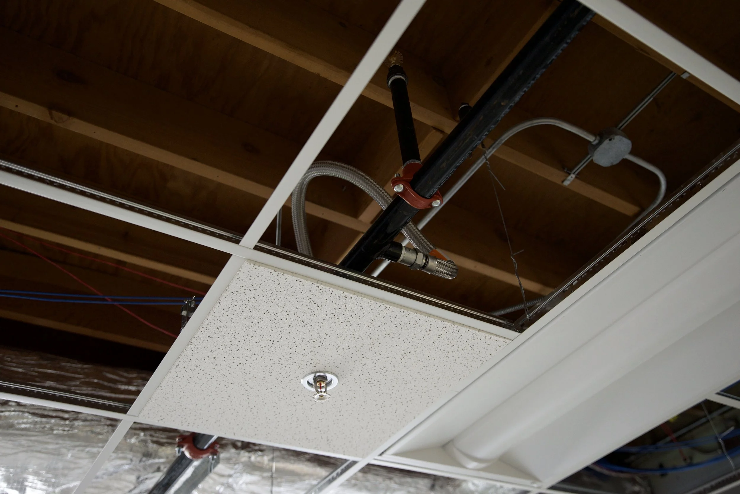 Previously, there was one sprinkler head in the entire building, now we have them throughout 