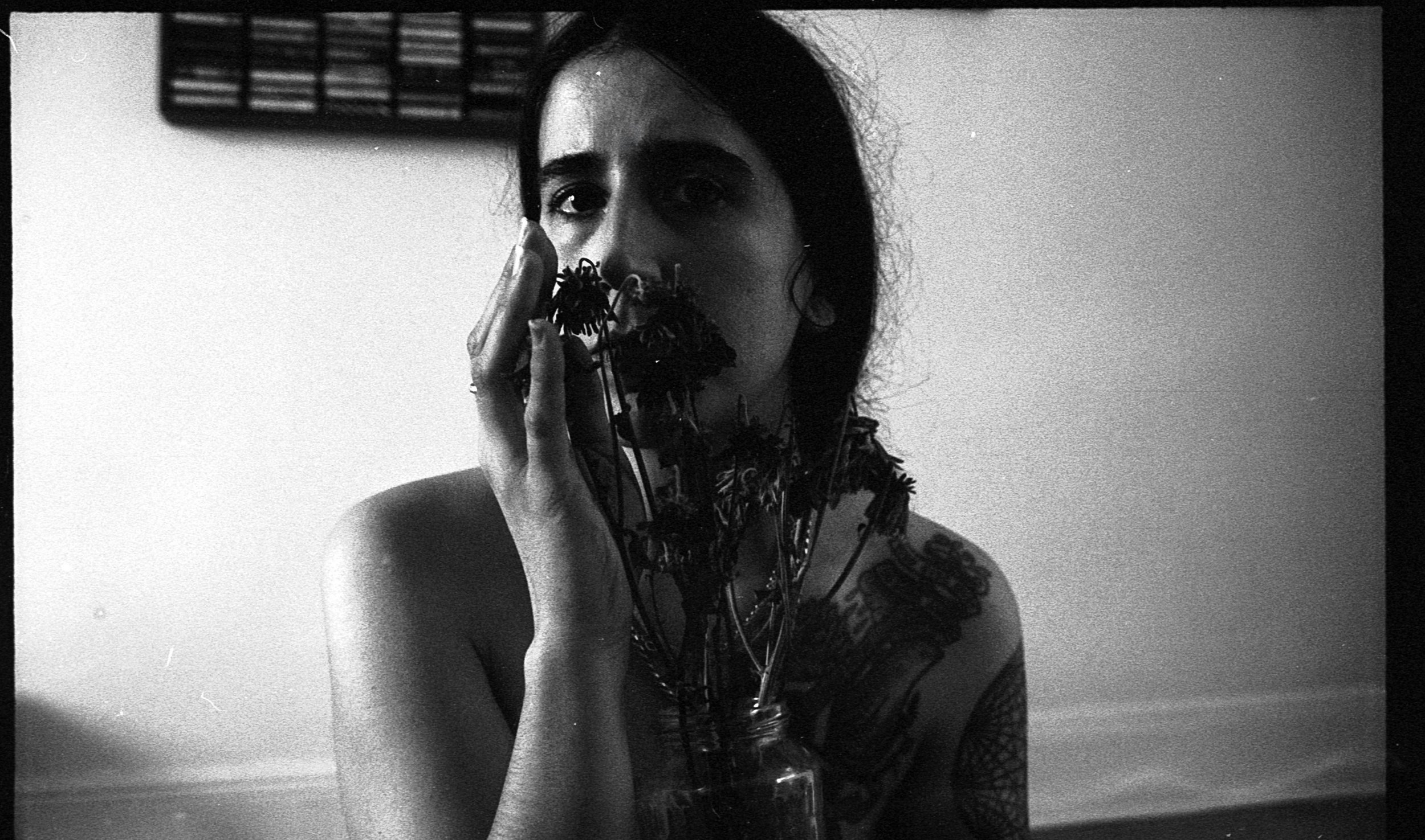 35mm, 35mm self-portrait developed in coffee and beer, 2020