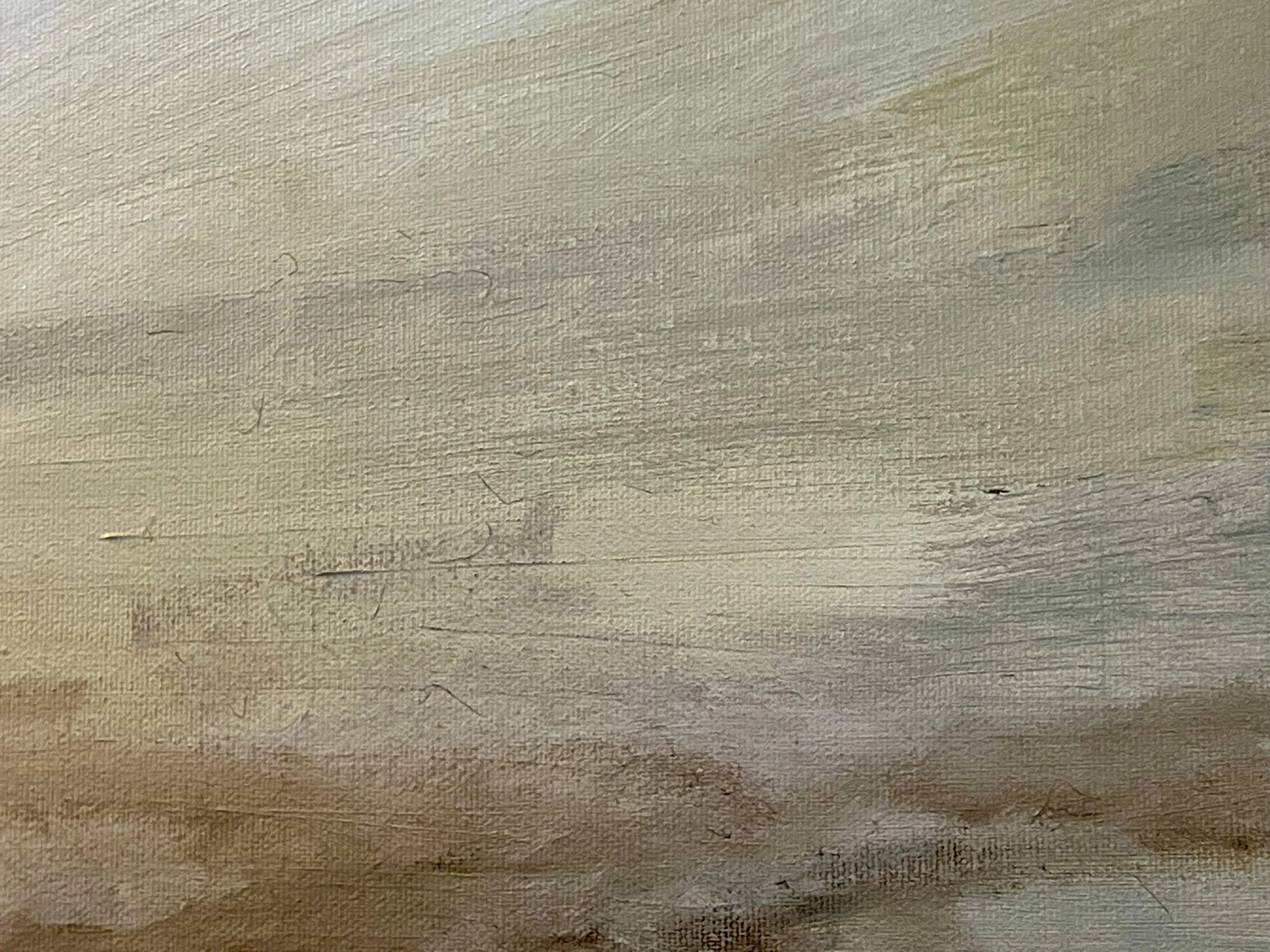 Close-up of a textured, painted wooden surface in beige and gray tones.