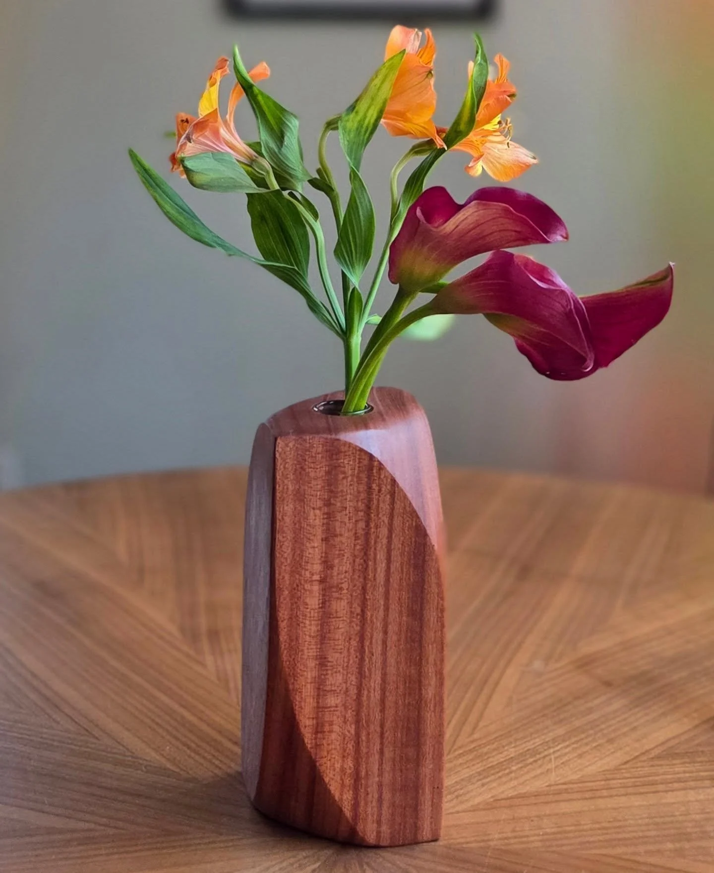 DIY for the holidays, part three: handmade mahogany bud vases, sculpted with an orbital sander. #diy #handmade #mahogany #vase #woodworking