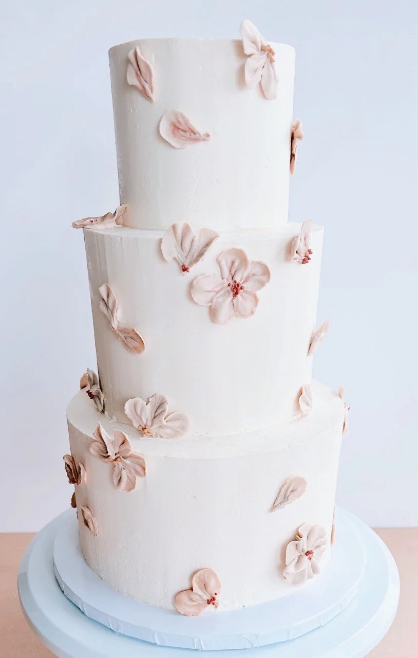Hand piped petal wedding cake