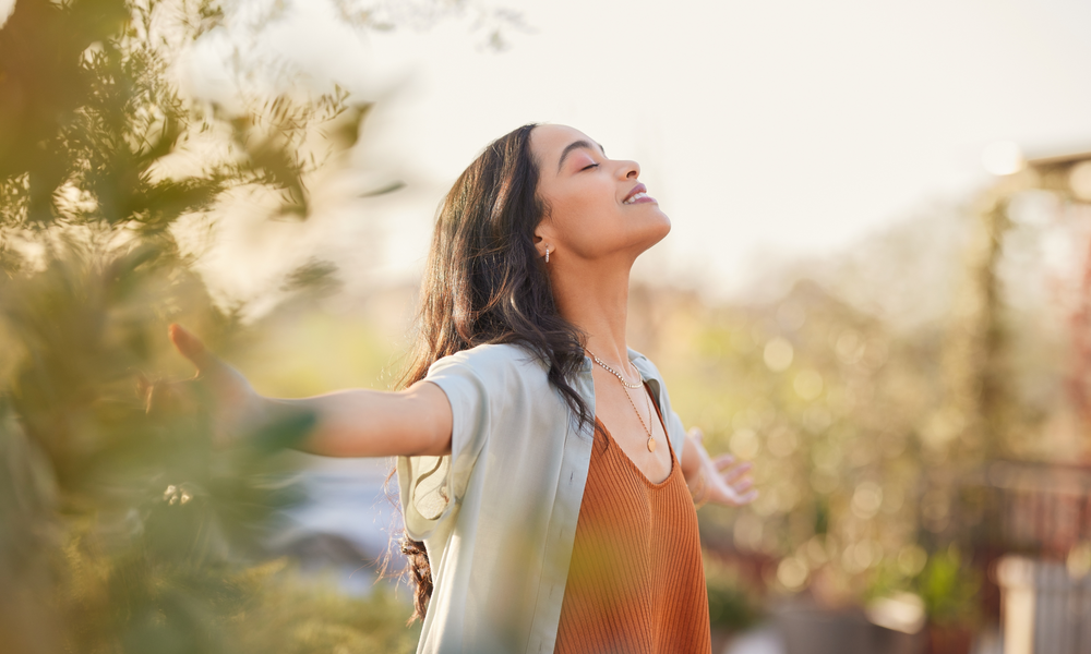 A person breathing freely outdoors