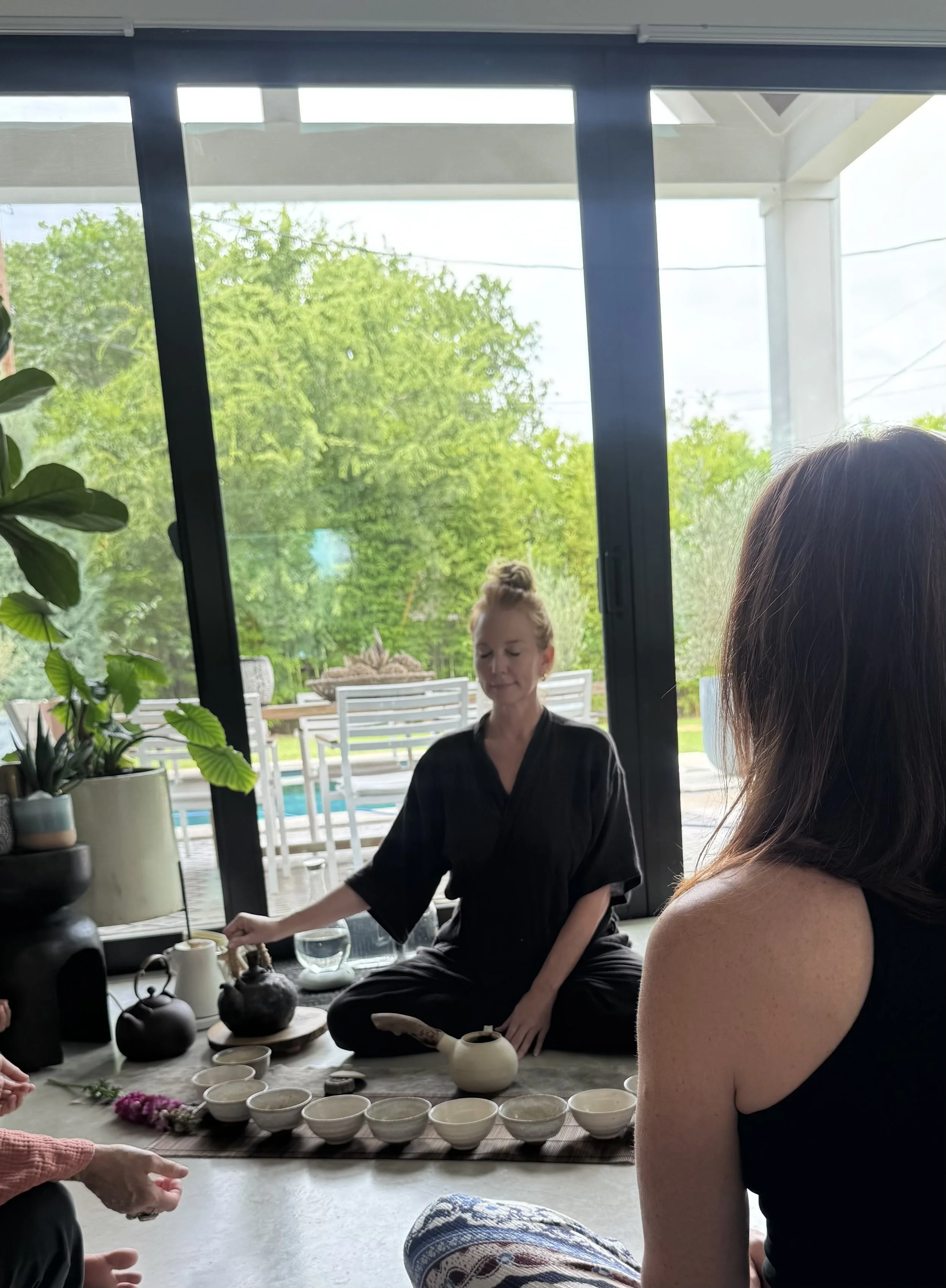 Dr. Cass leading tea Cermeony in her temple space home