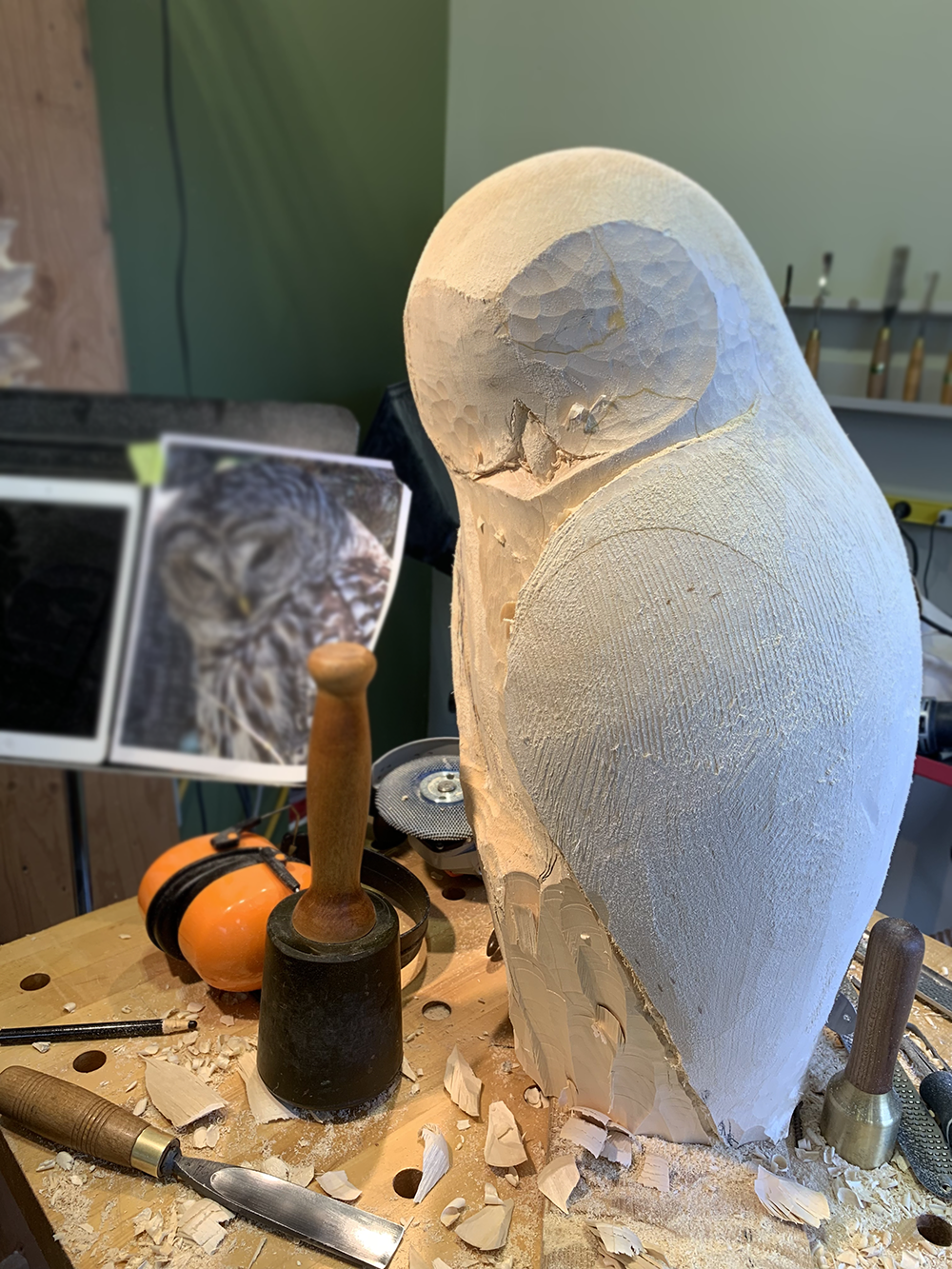 Hand-carved basswood owl sculpture titled Quiet Vigil.