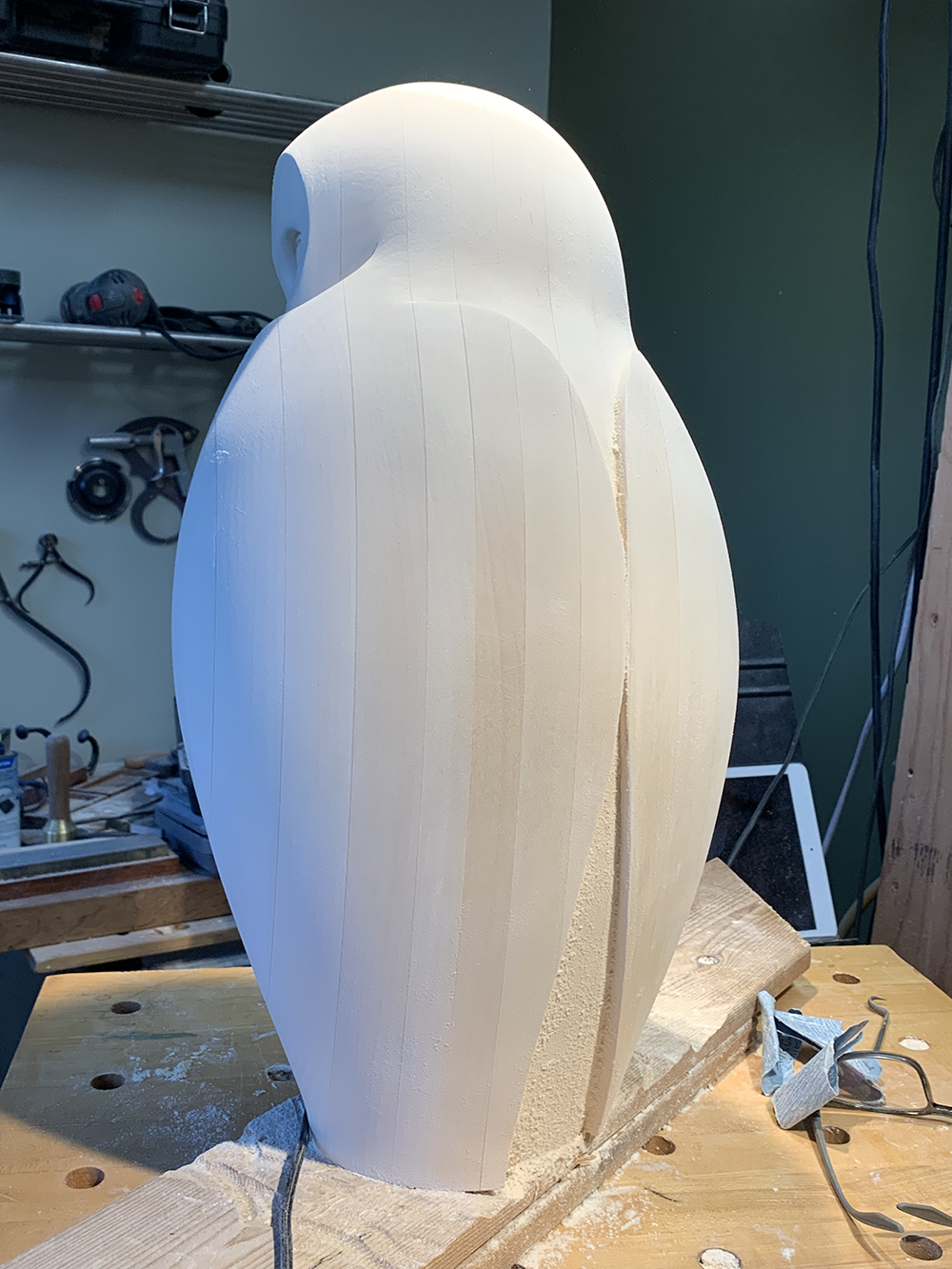 Hand-carved basswood owl sculpture titled Quiet Vigil.