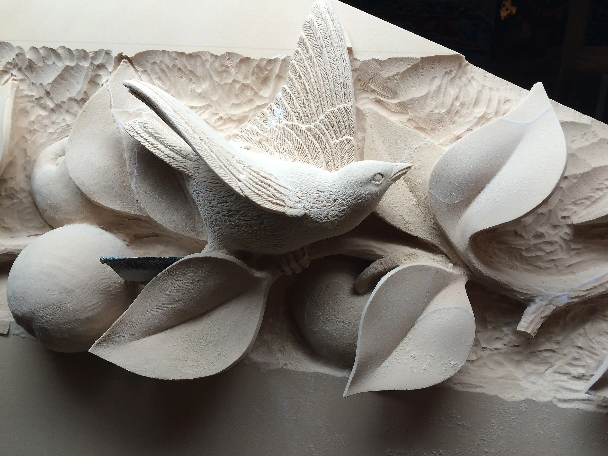 An architectural relief inspired by orchard landscapes, seasonal abundance, and the enduring relationship between home and place.