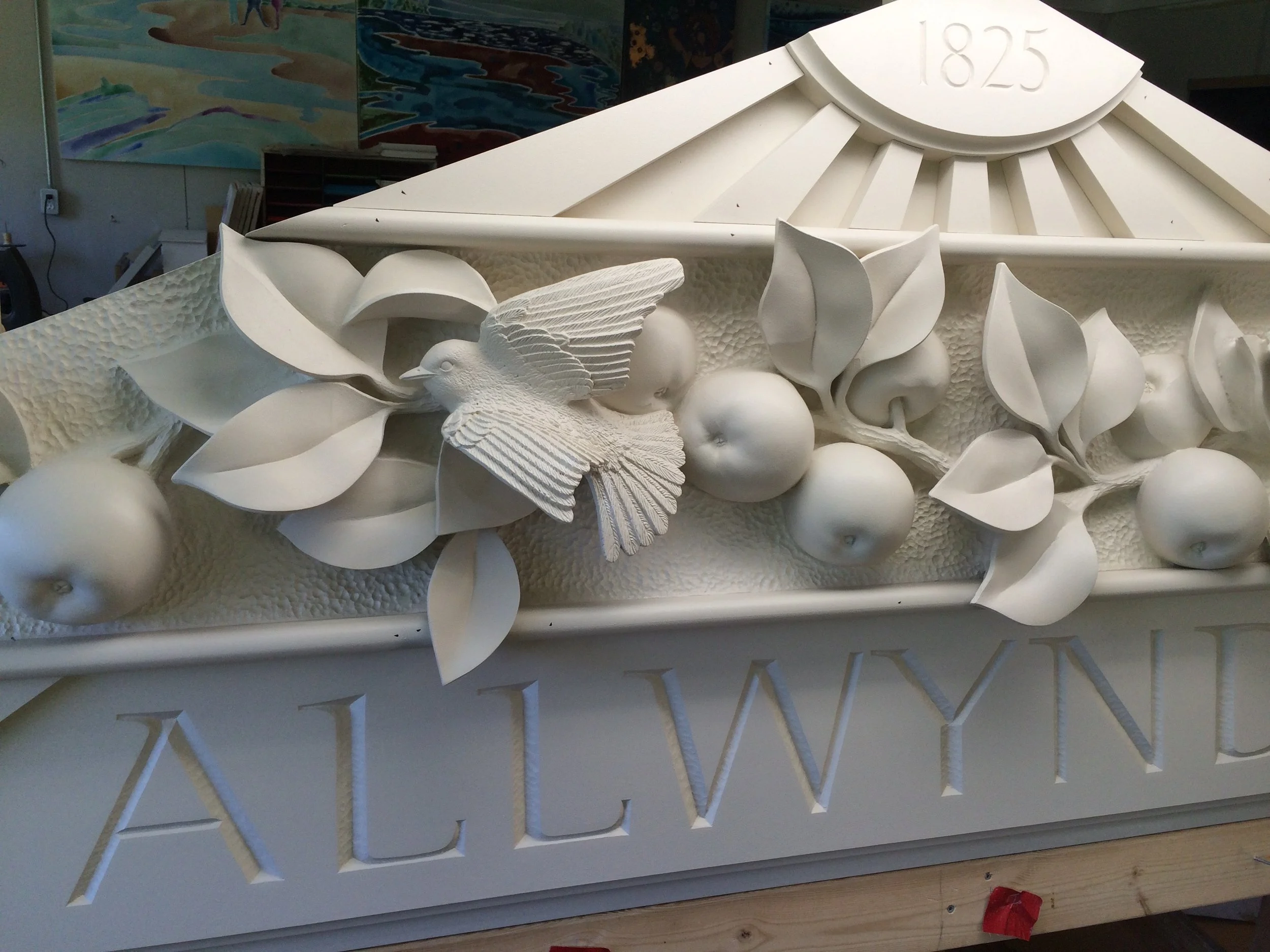 An architectural relief inspired by orchard landscapes, seasonal abundance, and the enduring relationship between home and place.