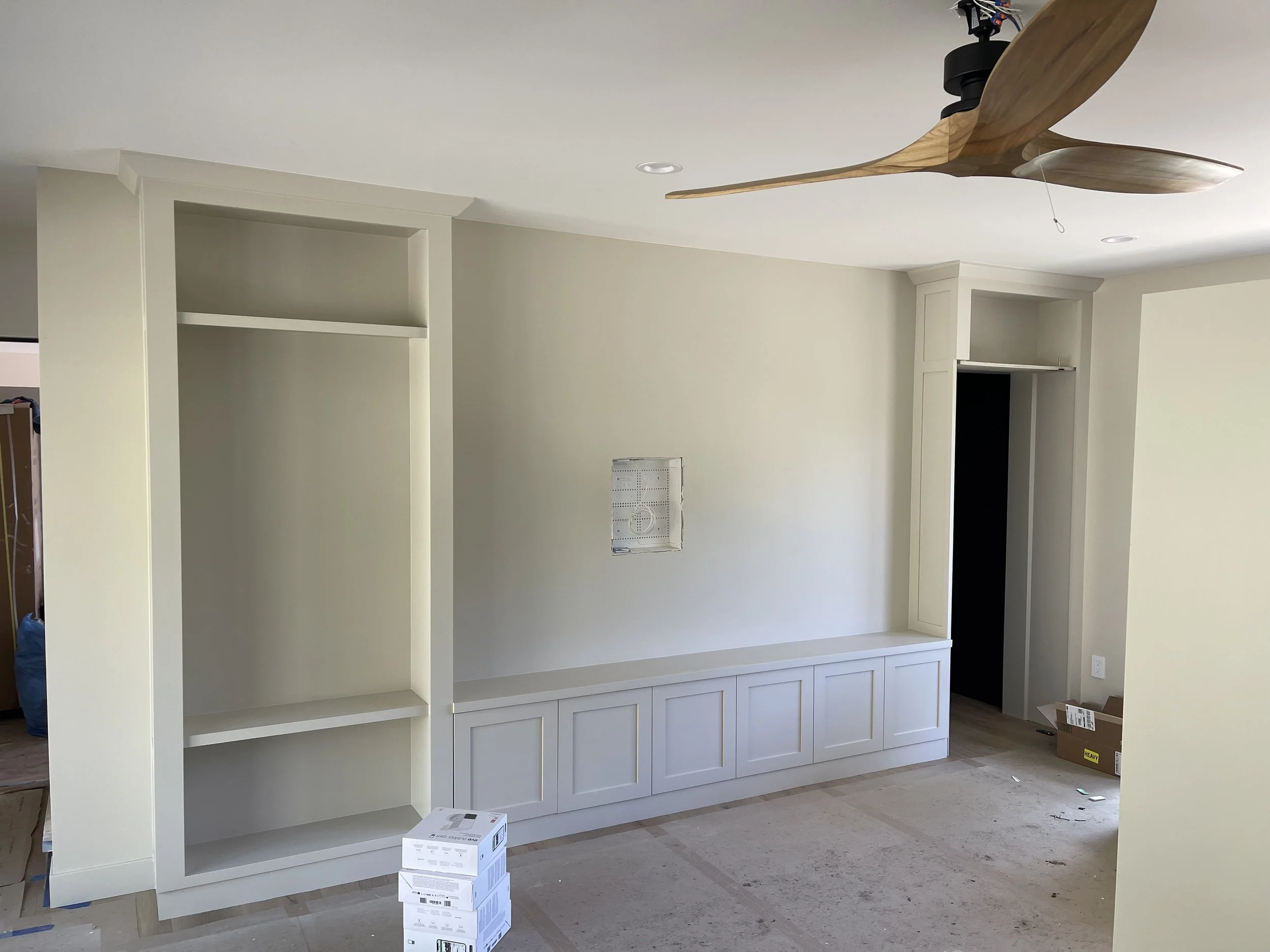 Hidden built-in door in custom built entertainment console