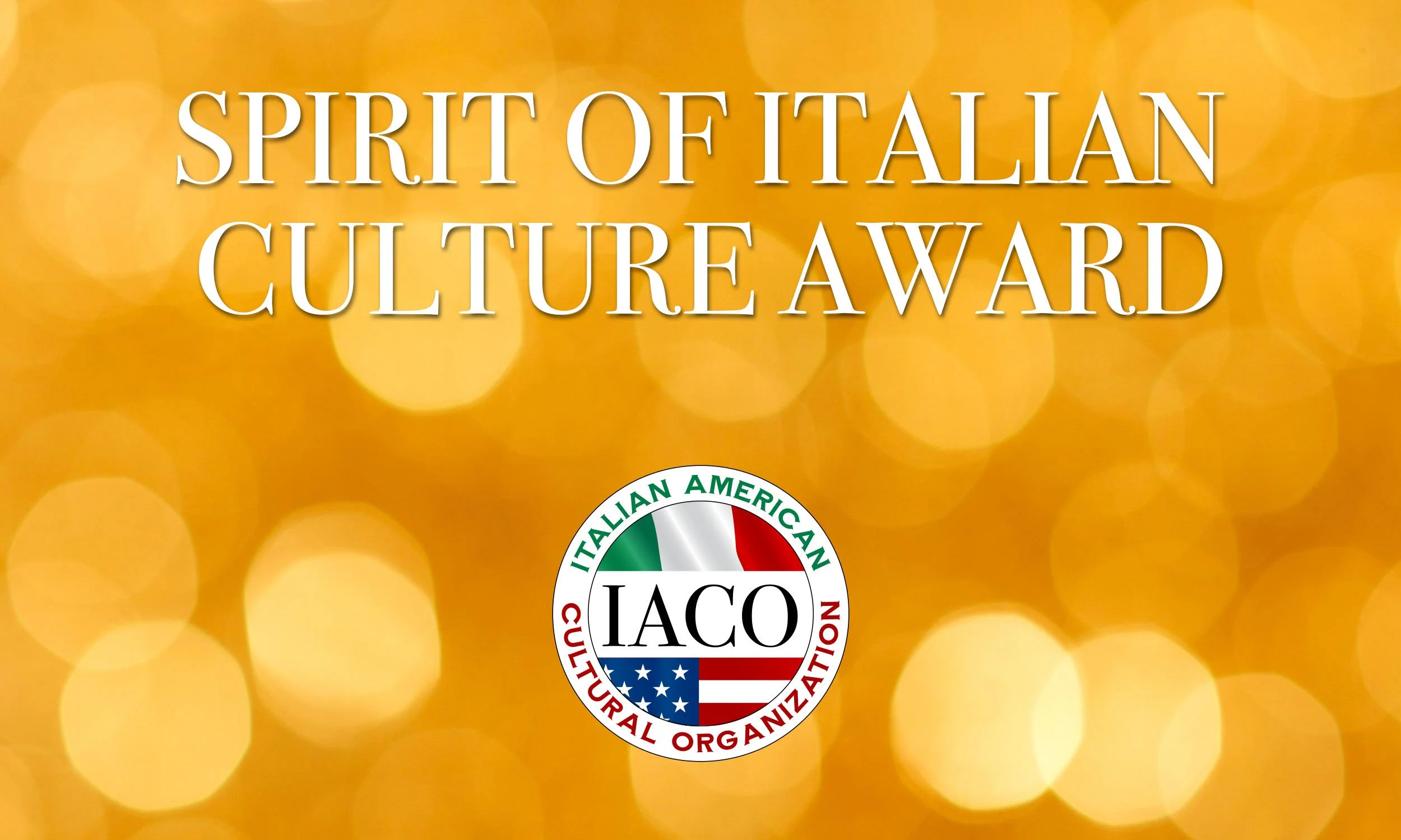 Golden background with the text 'Spirit of Italian Culture Award' and the IACO logo at the bottom, representing the Italian American Cultural Organization.