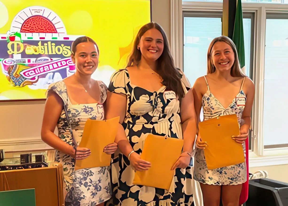 Golden background with the text 'Spirit of Italian Culture Award' and the IACO logo at the bottom, representing the Italian American Cultural Organization.