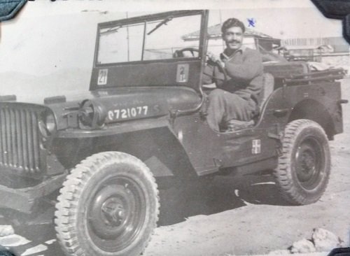 4 Chris in the Army jeep, 1940s.jpg