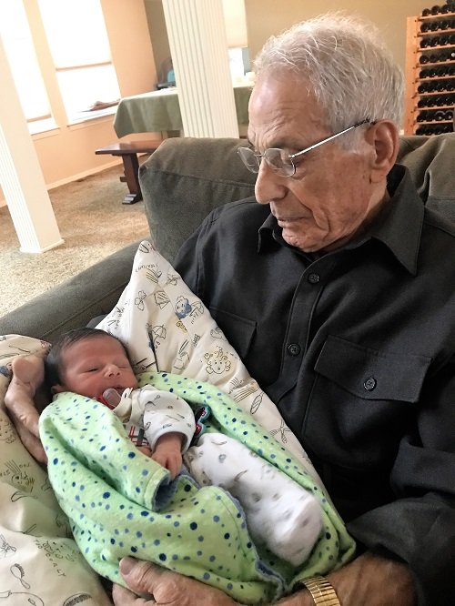 17 Papou Chris with great-grandson Nicholas Andrew Sophinos, 2017.jpg