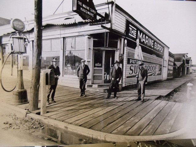 11 Store outside Jack Retzloff on left, Mike on rignt, circa 1920.jpg