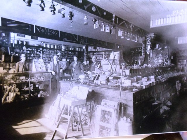 13 Store, inside with Mike on left,circa 1920.jpg