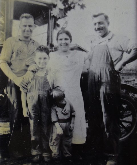 8 John Pulakis family John, Strato, Katherine Koko Pulakis and Thrasivoulos, early 1920s.jpg