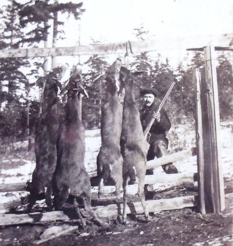 5 Steve with four deer, circa 1920.jpg