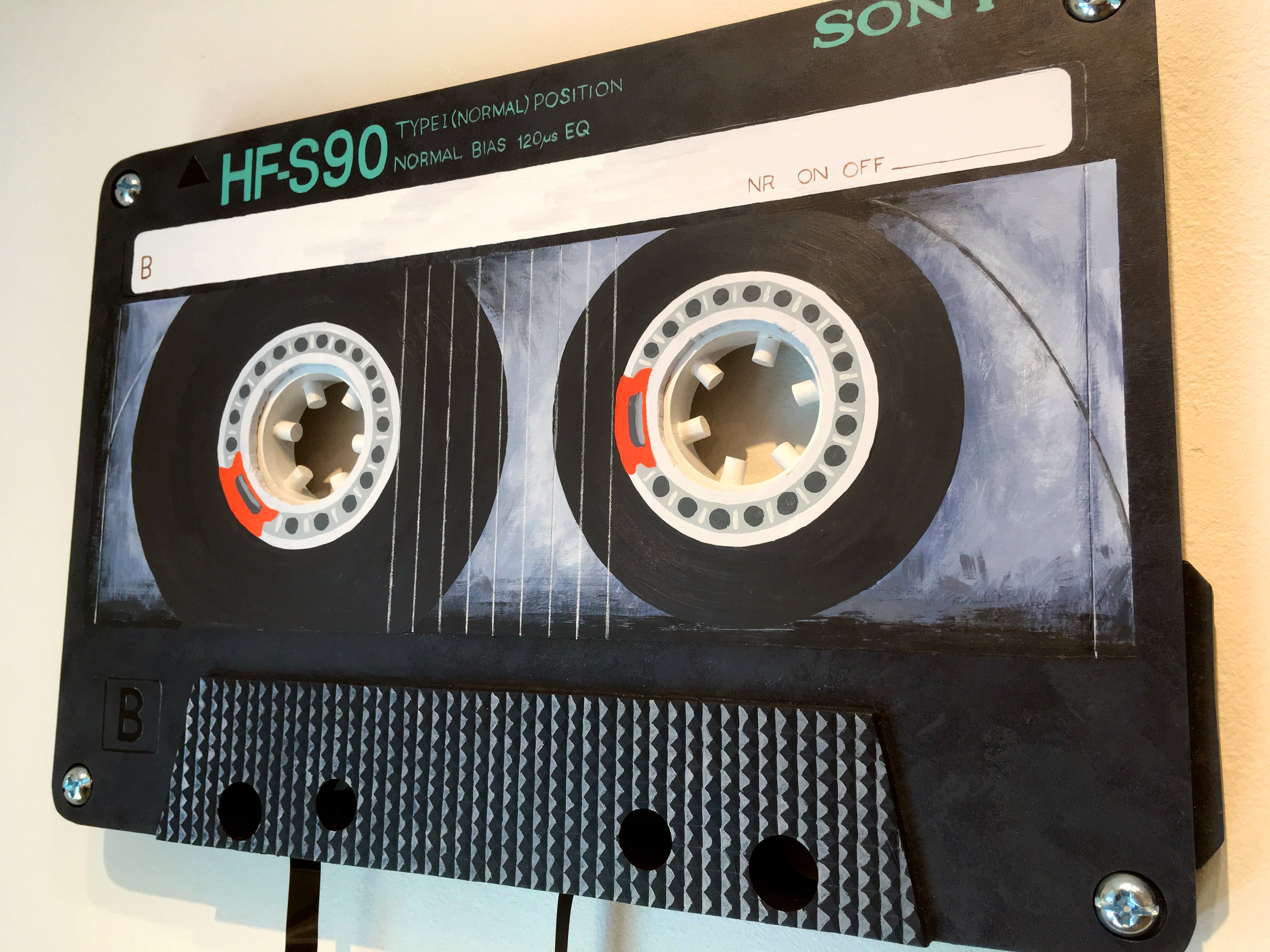 "Cassette Tape (Sony)", (acrylic paint on wood panel with metal screws and VHS tape, 12x18") SOLD