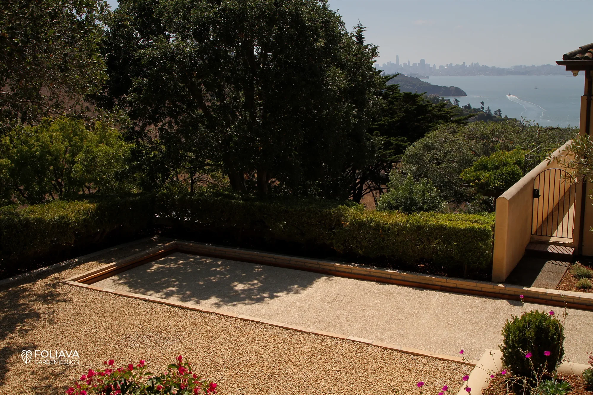 Luxury garden in Tiburon with bocce ball court, a fountain, and sweeping views of San Francisco Bay.
