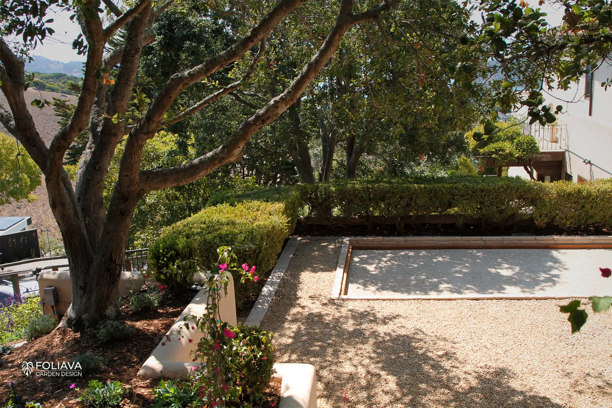 Tuscan-inspired bocce ball court in Tiburon, framed by drought-tolerant gardens and bay views.