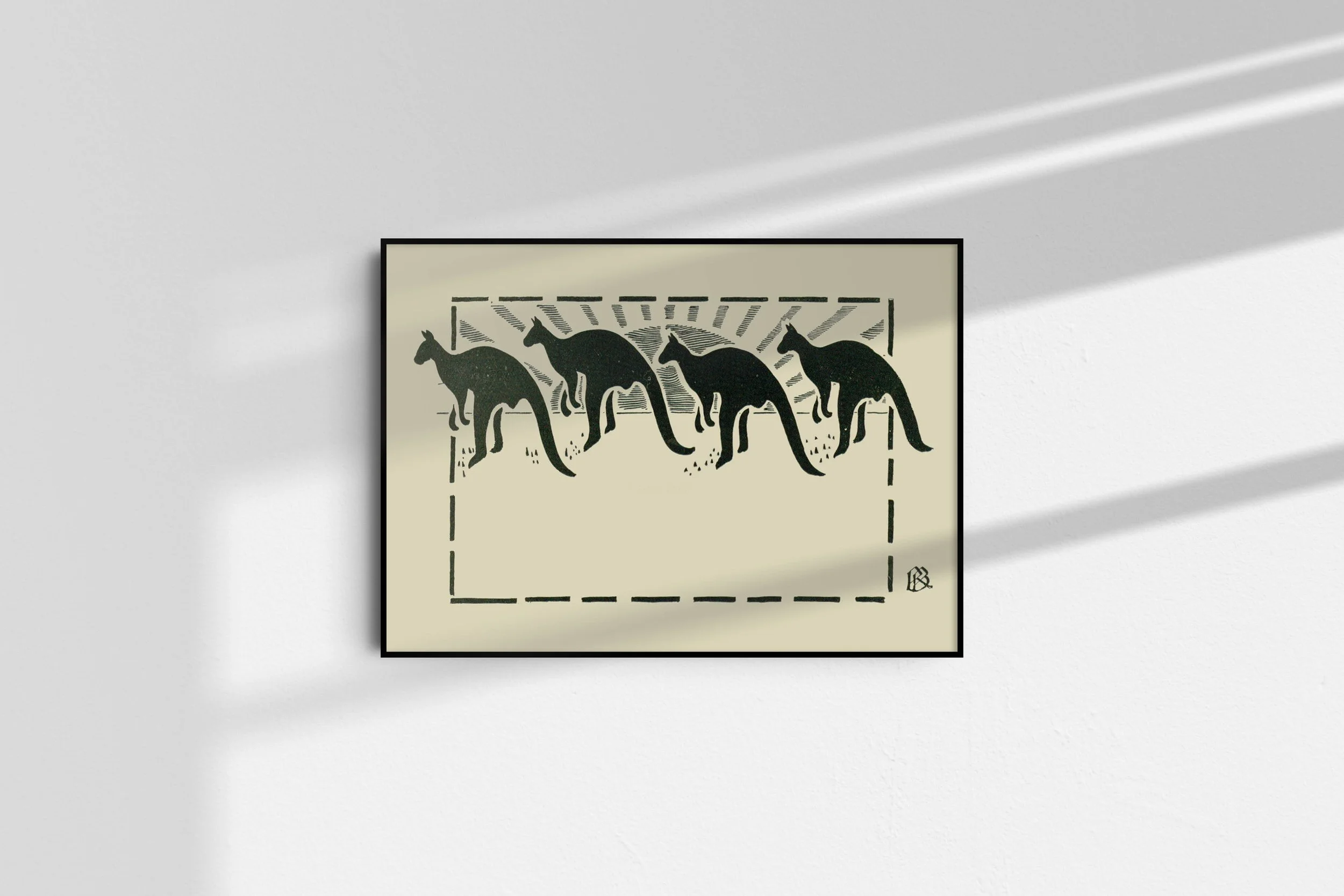 A framed Australiana print by R. Buring on a wall featuring four kangaroos hopping with the sun behind.