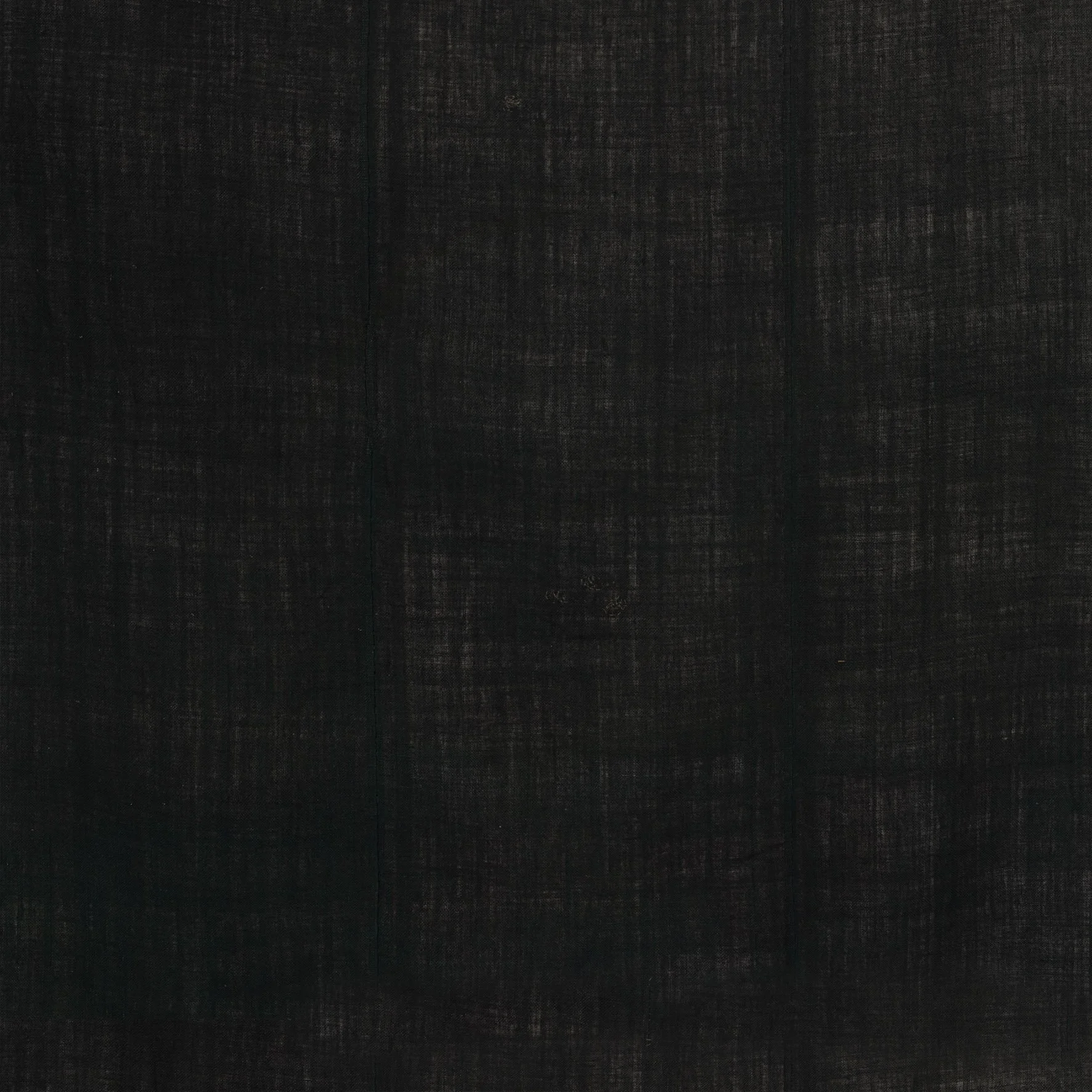 A wallpaper sample showing texture in a dark moody tone.