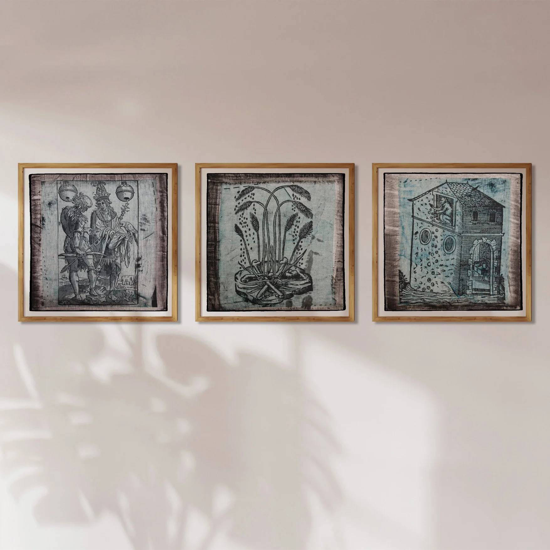 Three framed decorex prints of illustrations by Claude Paradin onto antique linen (Hunters, wheat, monkey).