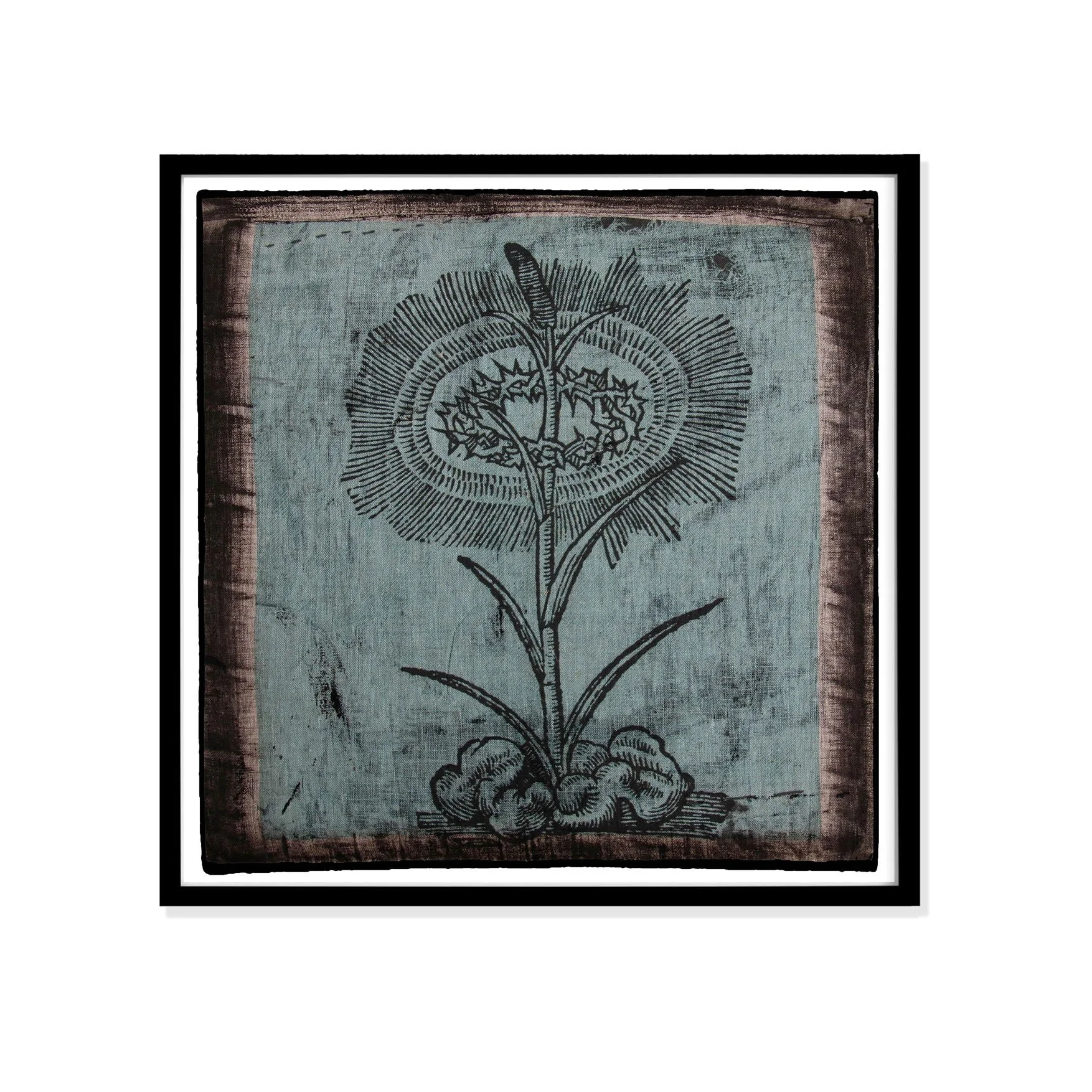 Illustration of spring by Claude Paradin with antique linen in a black frame against a white wall.