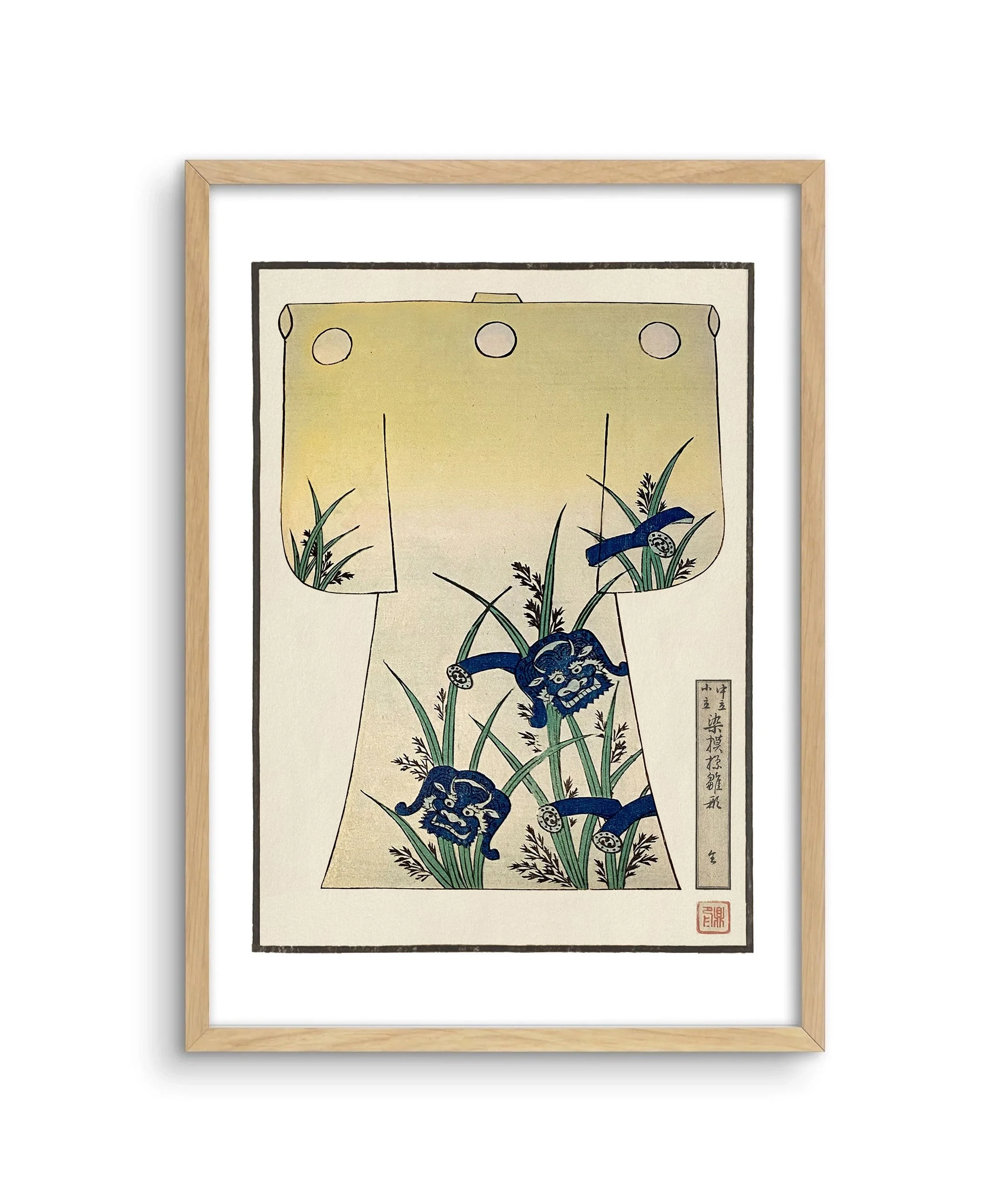 A framed image of a children's kimono design in gold with blue dragons.